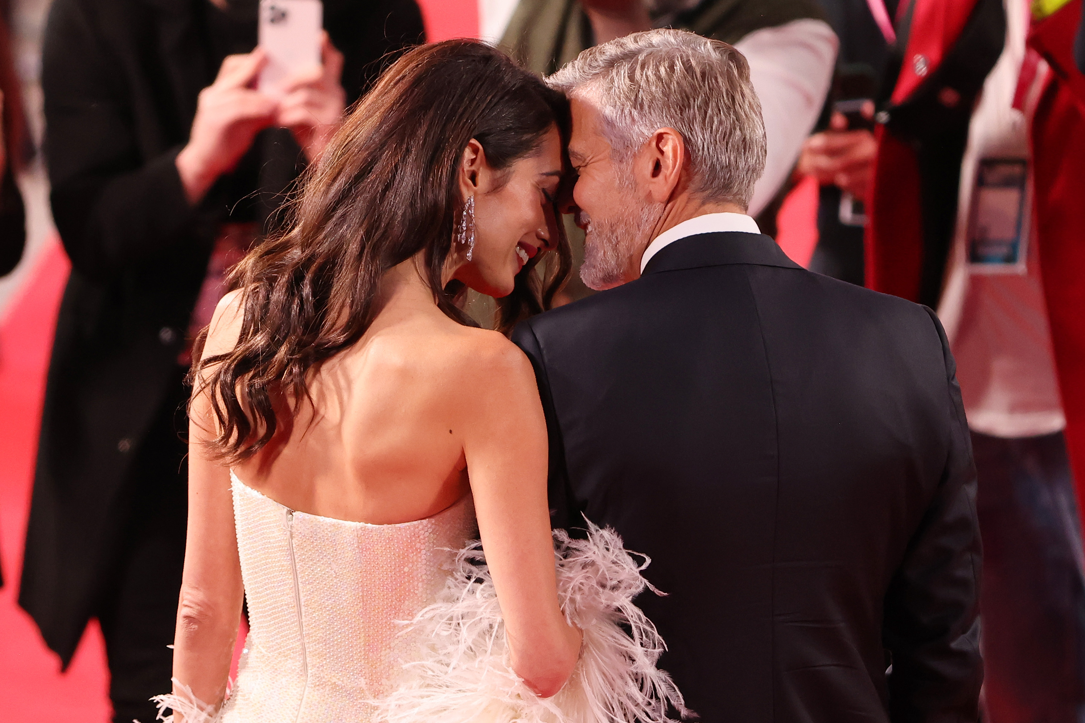 Amal Clooney and George Clooney attend "The Tender Bar" Premiere during the 65th BFI London Film Festival at The Royal Festival Hall, on October 10, 2021, in London, England. | Source: Getty Images