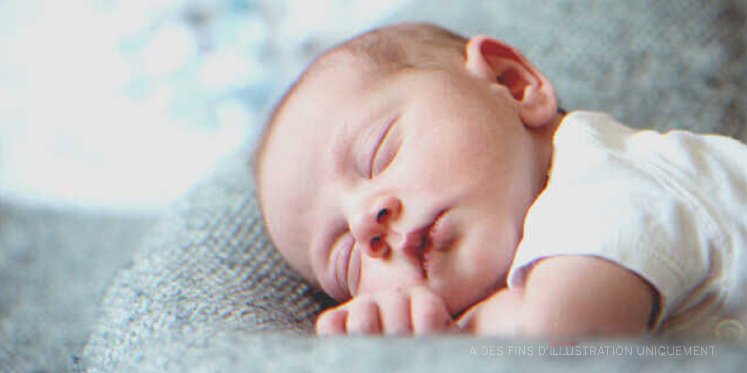 Un bébé  qui dort | Photo : Shutterstock