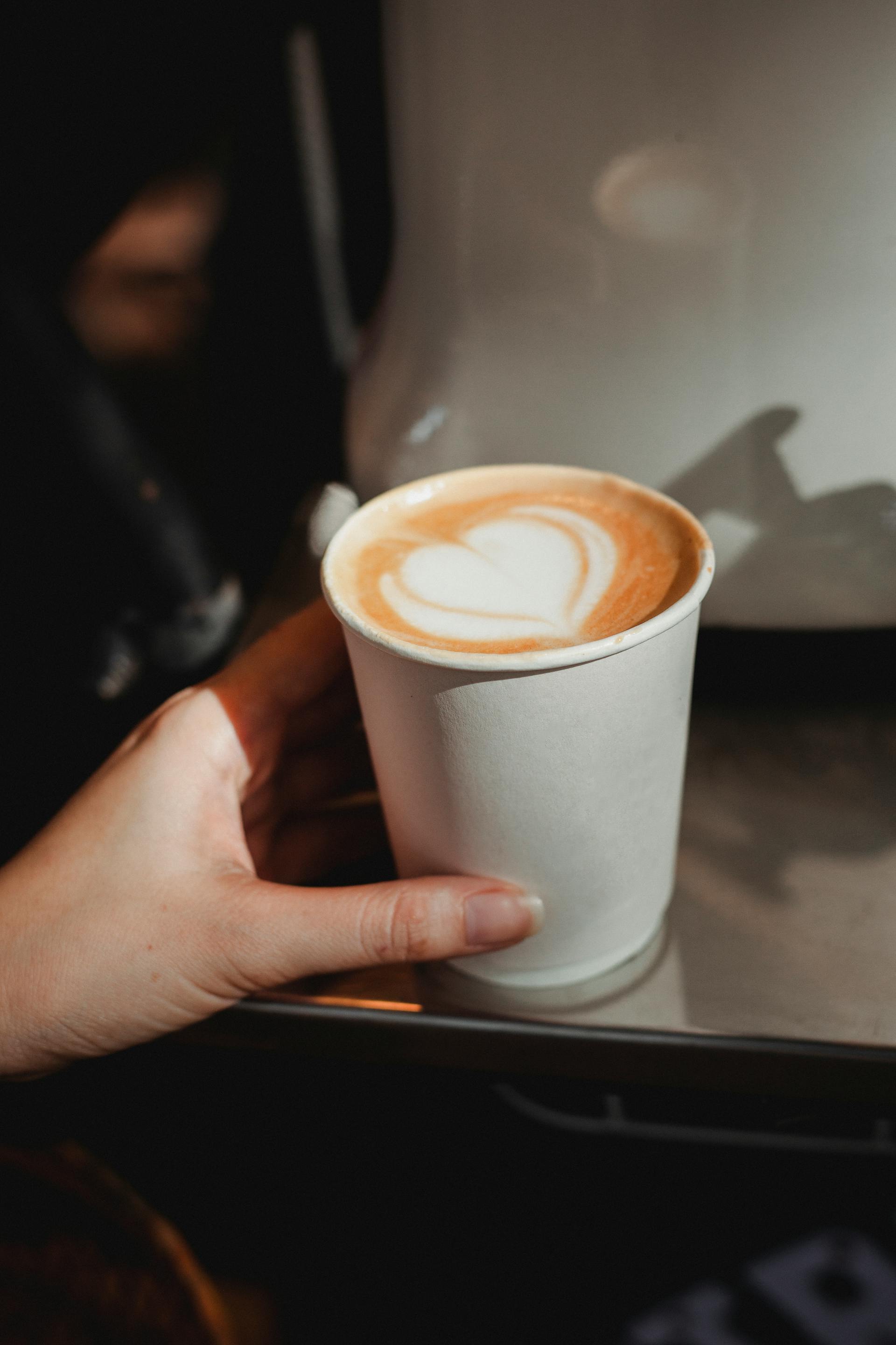 A person holding a coffee cup | Source: Pexels