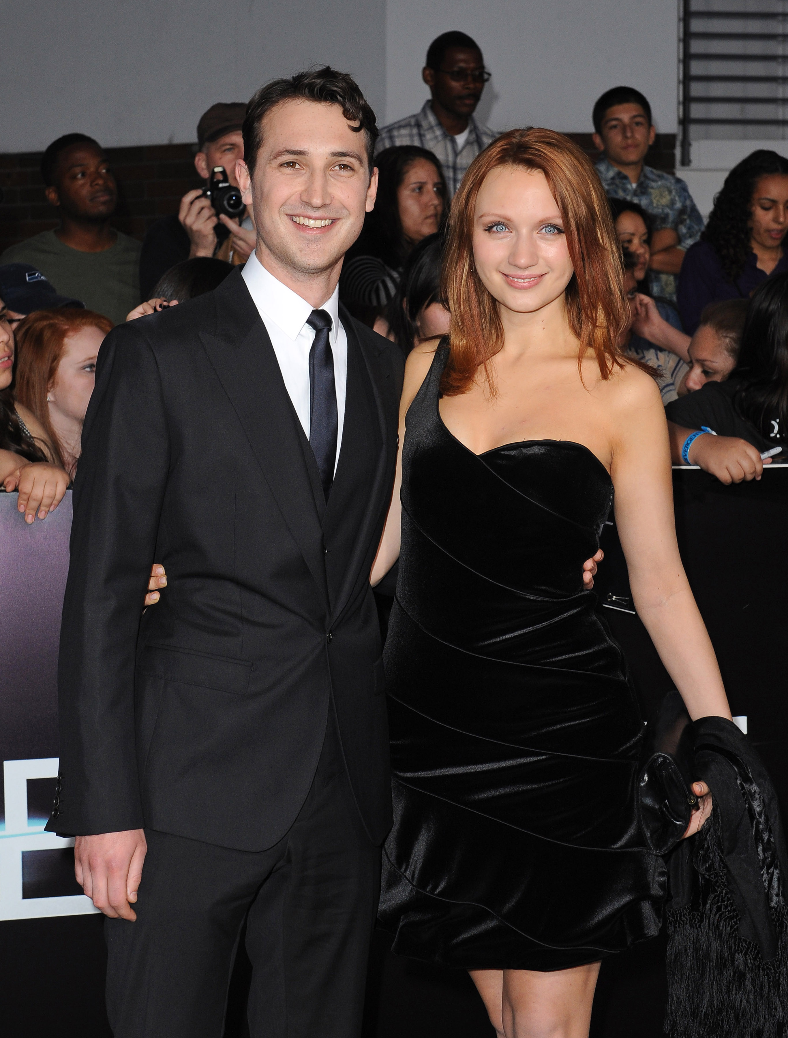 Actor Ben Lloyd-Hughes and Emily Berrington arrive at the Los Angeles Premiere of "Divergent" at Regency Bruin Theatre on March 18, 2014 in Los Angeles, California | Source: Getty Images