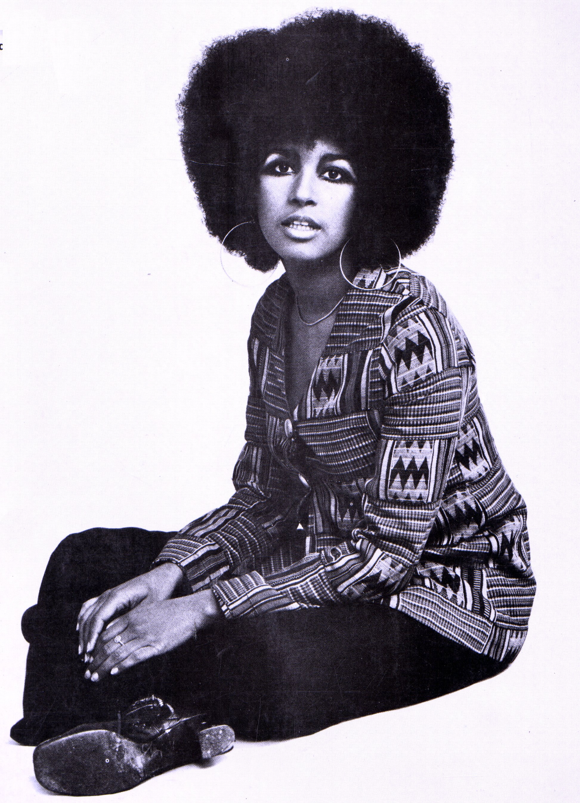 Novelist and biographer Marsha Hunt photographed while sitting with her legs crossed in 1970. / Source: Getty Images