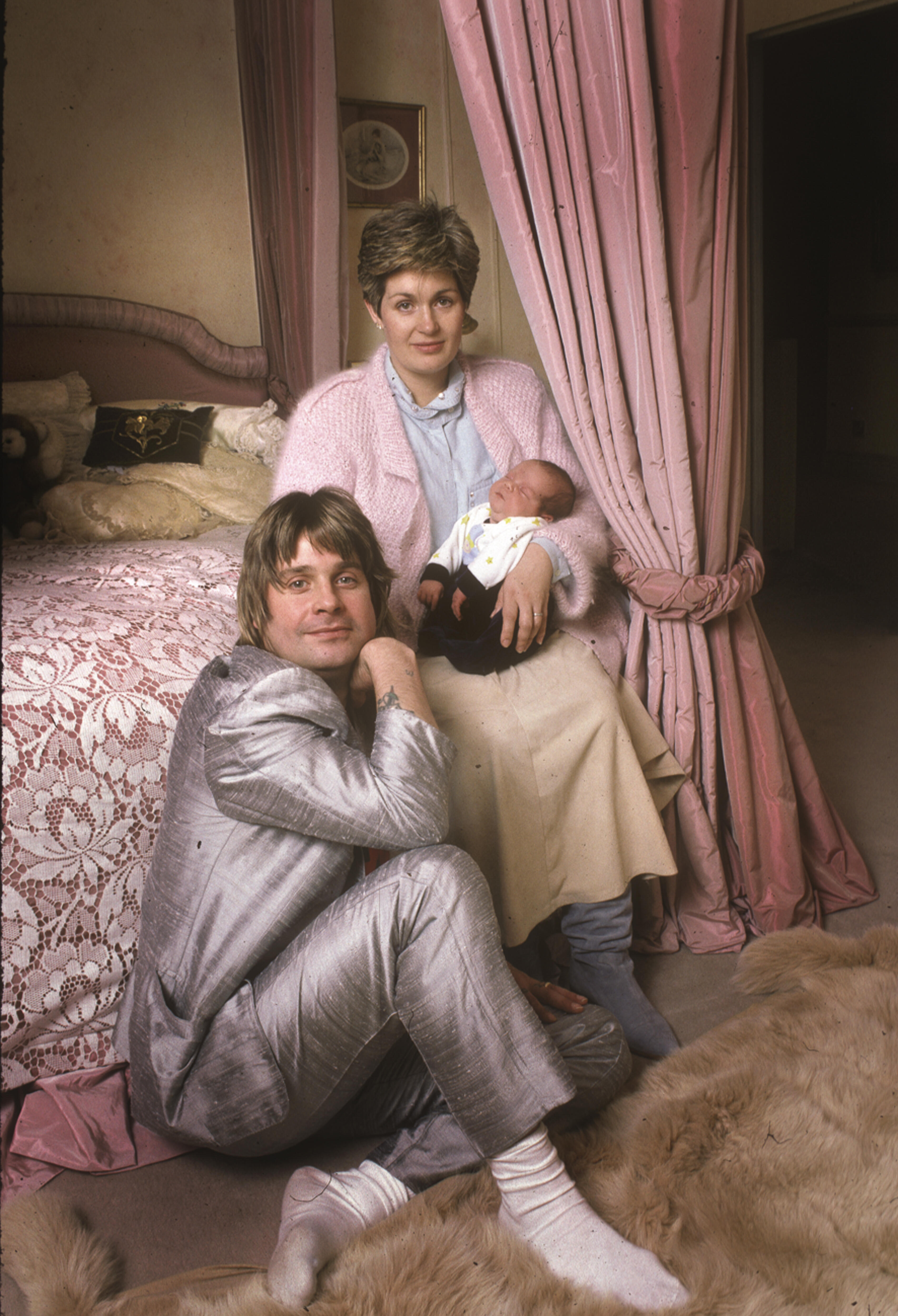 Sharon and Ozzy Osbourne photographed with their son, Jack, at their home in London, England, 1985. | Source: Getty Images
