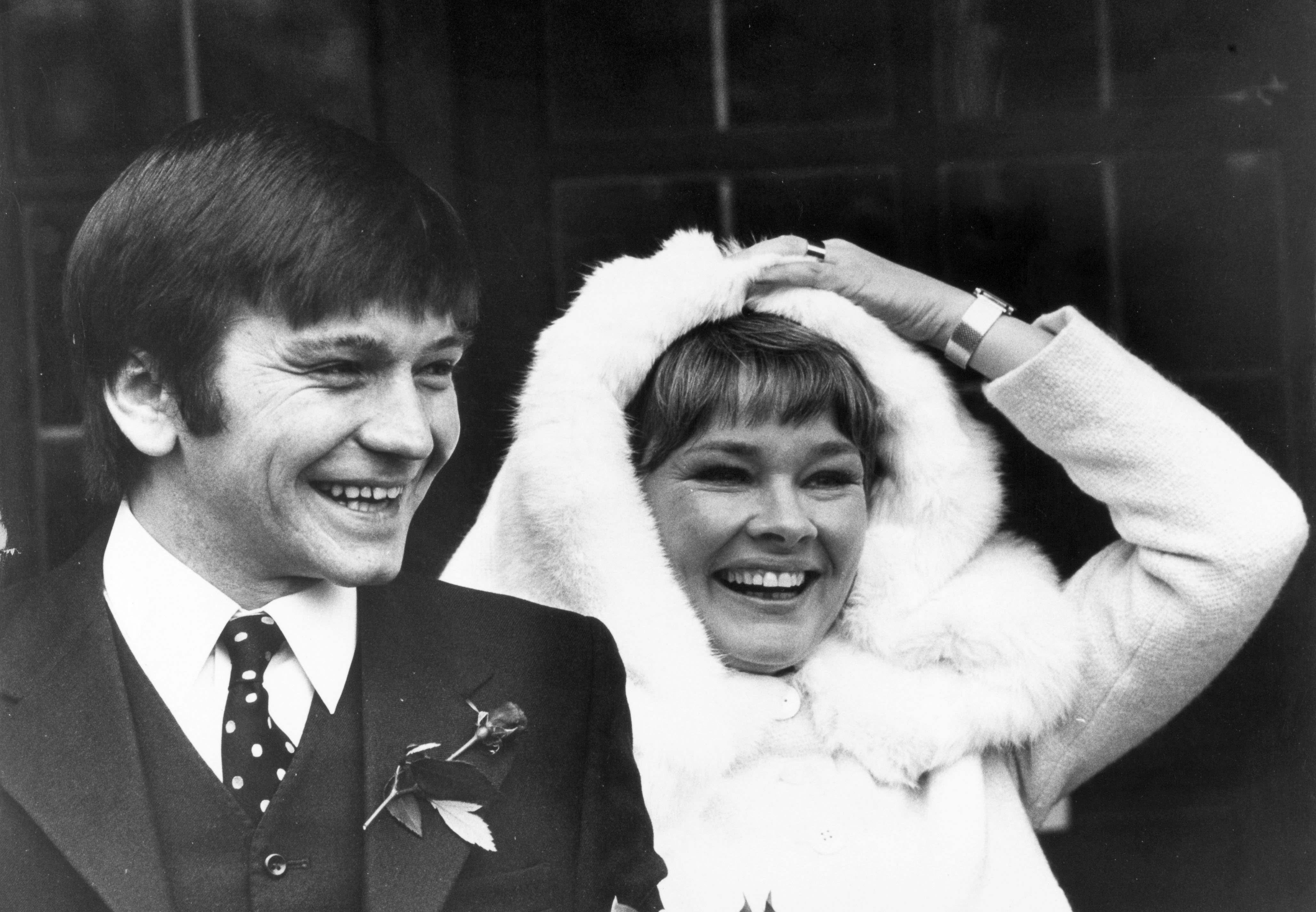 Michael Williams and Judi Dench after their wedding at St, Mary's, Hampstead on February 6, 1971 in Hampstead, London ┃Source: Getty Images