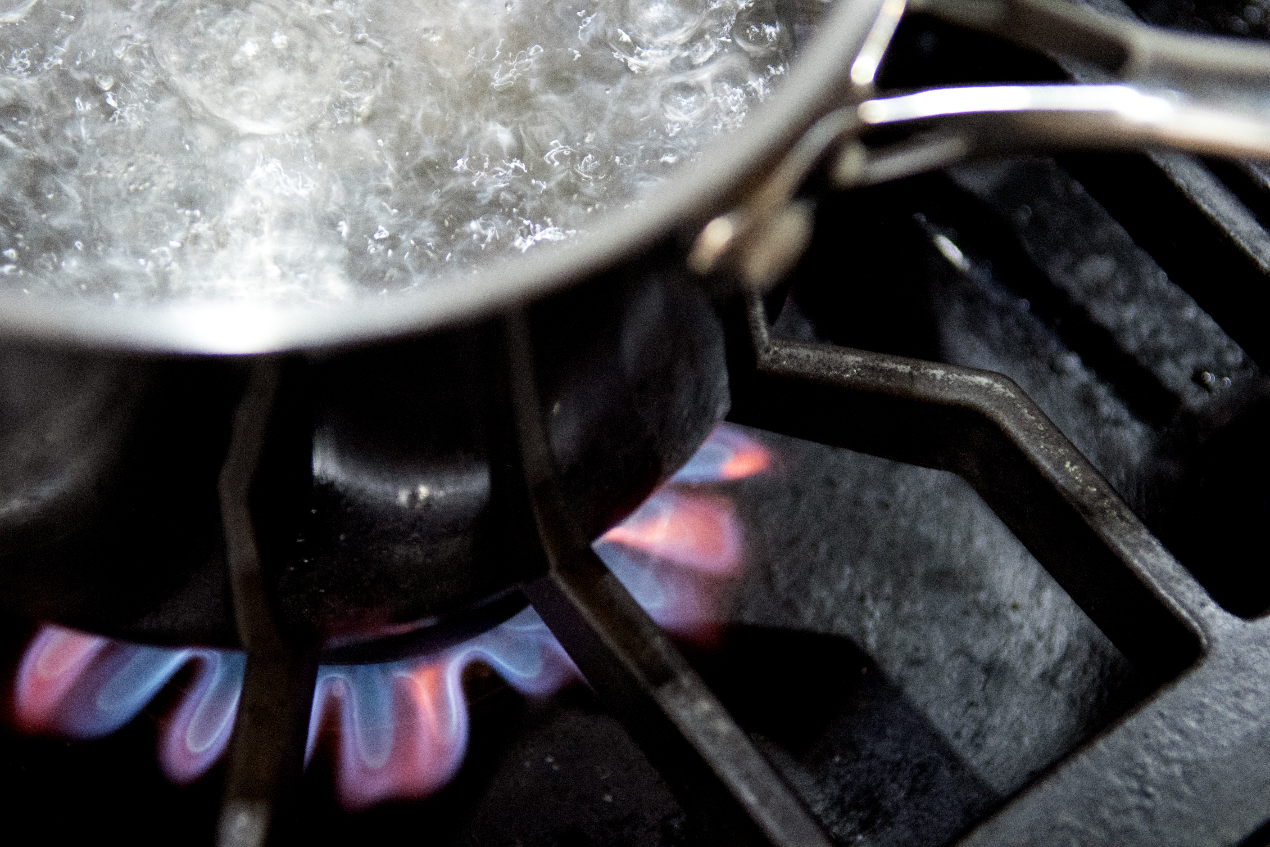 Water boiling on a gas stove | Source: Getty Images