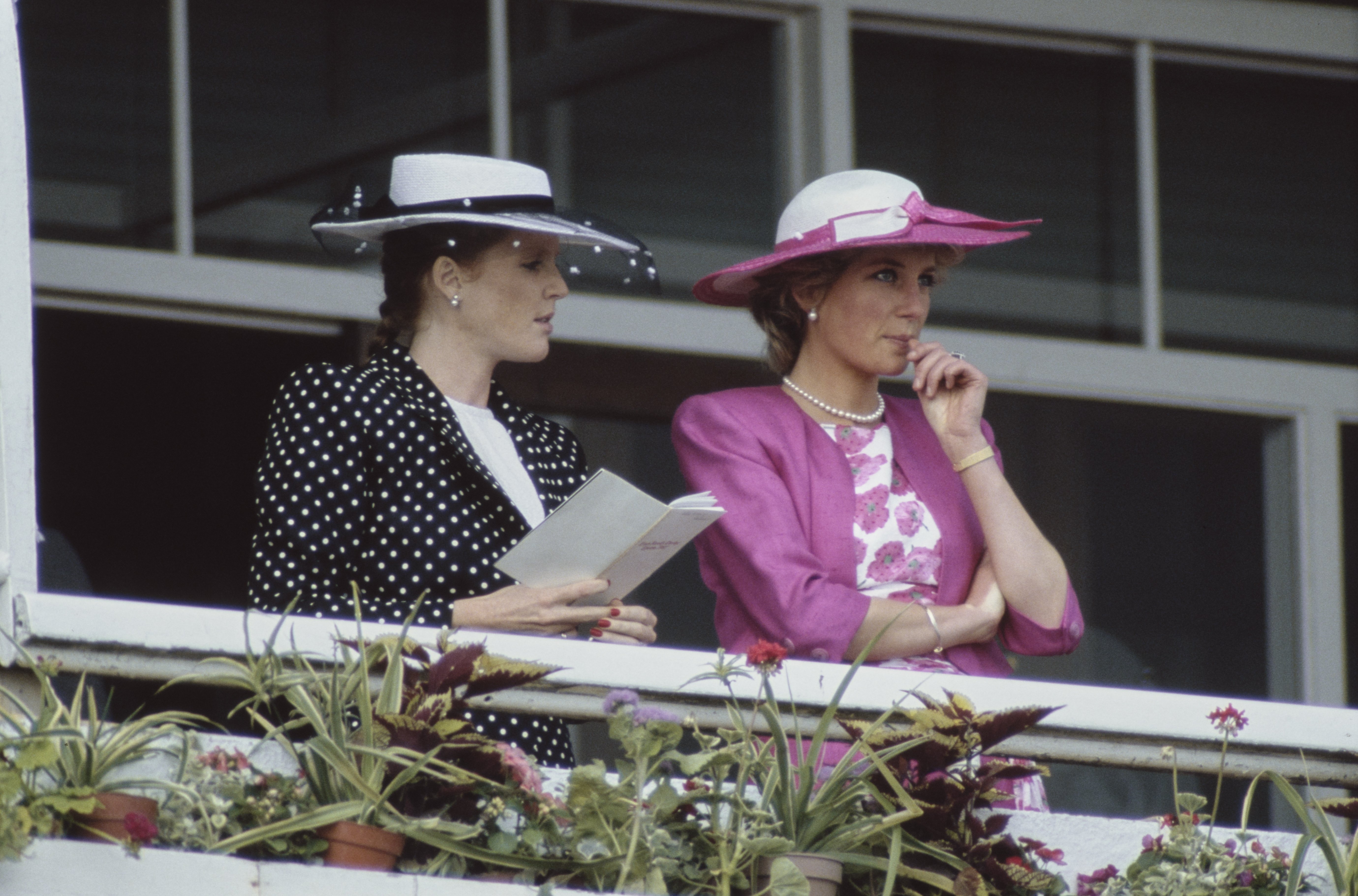 Sarah Ferguson, Duchess of York and Princess Diana attending the Derby Day meeting at Epsom Downs Racecourse on June 3, 1987 in Epsom, Surrey. | Source: Getty Images