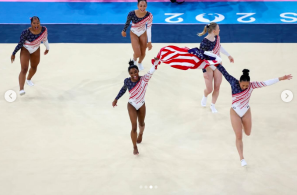 Simone Biles celebrating with the rest of Team USA Gymnastics during the Paris Olympics, posted on July 31, 2024 | Source: Instagram/simonebiles