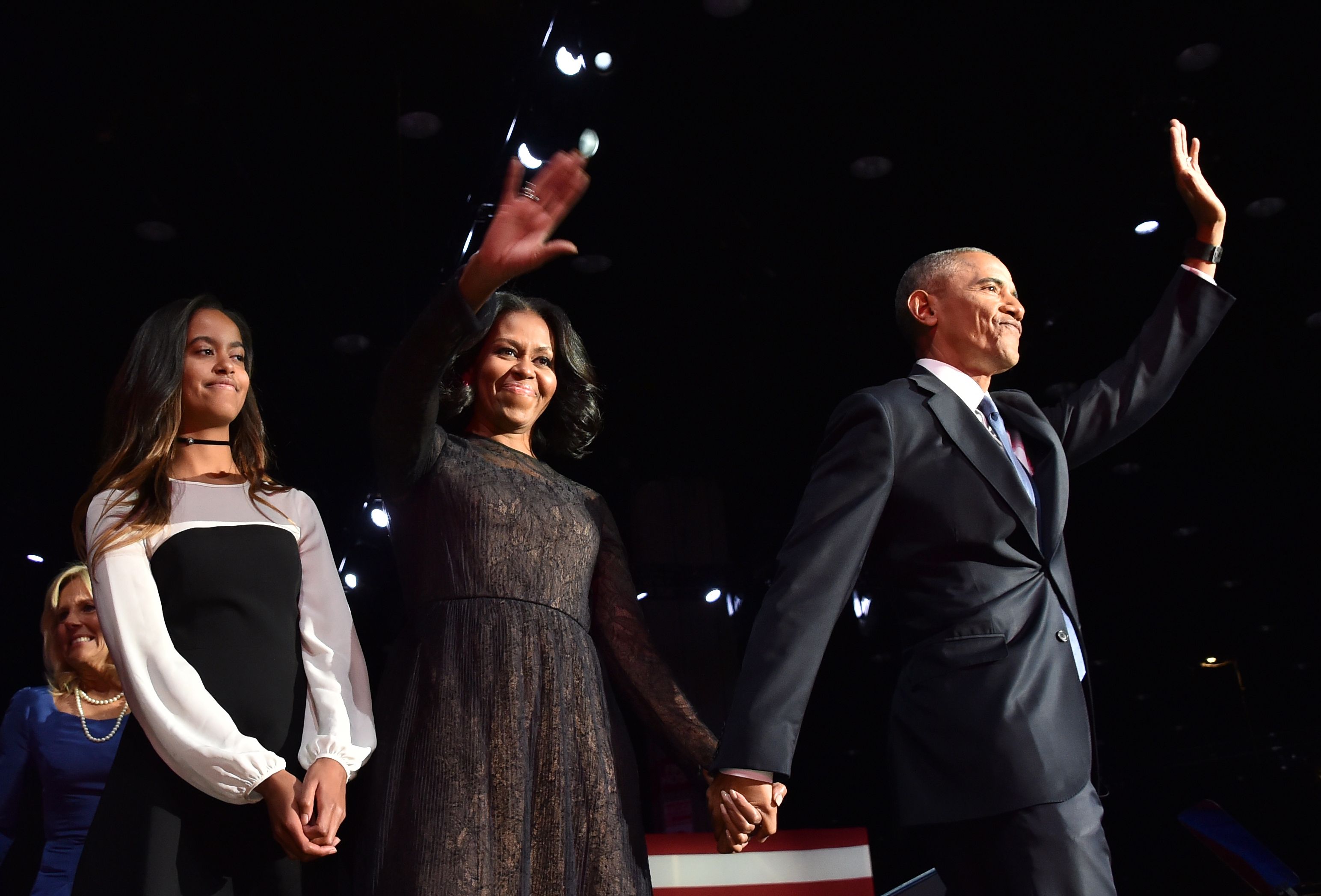 Malia looks at the crowd as Michelle Obama and Barack Obama wave to supporters on January 10, 2017, in Chicago, Illinois. | Source: Getty Images