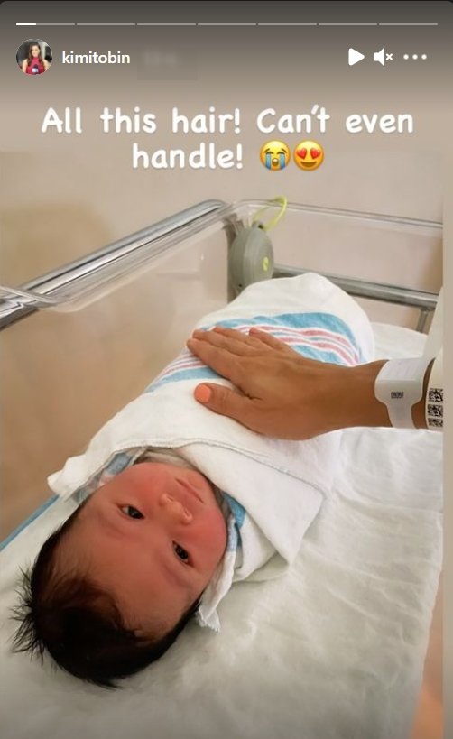 Kimi Tobin's photo of her newly born child on her Instagram story | Photo: Instagram / kimitobin