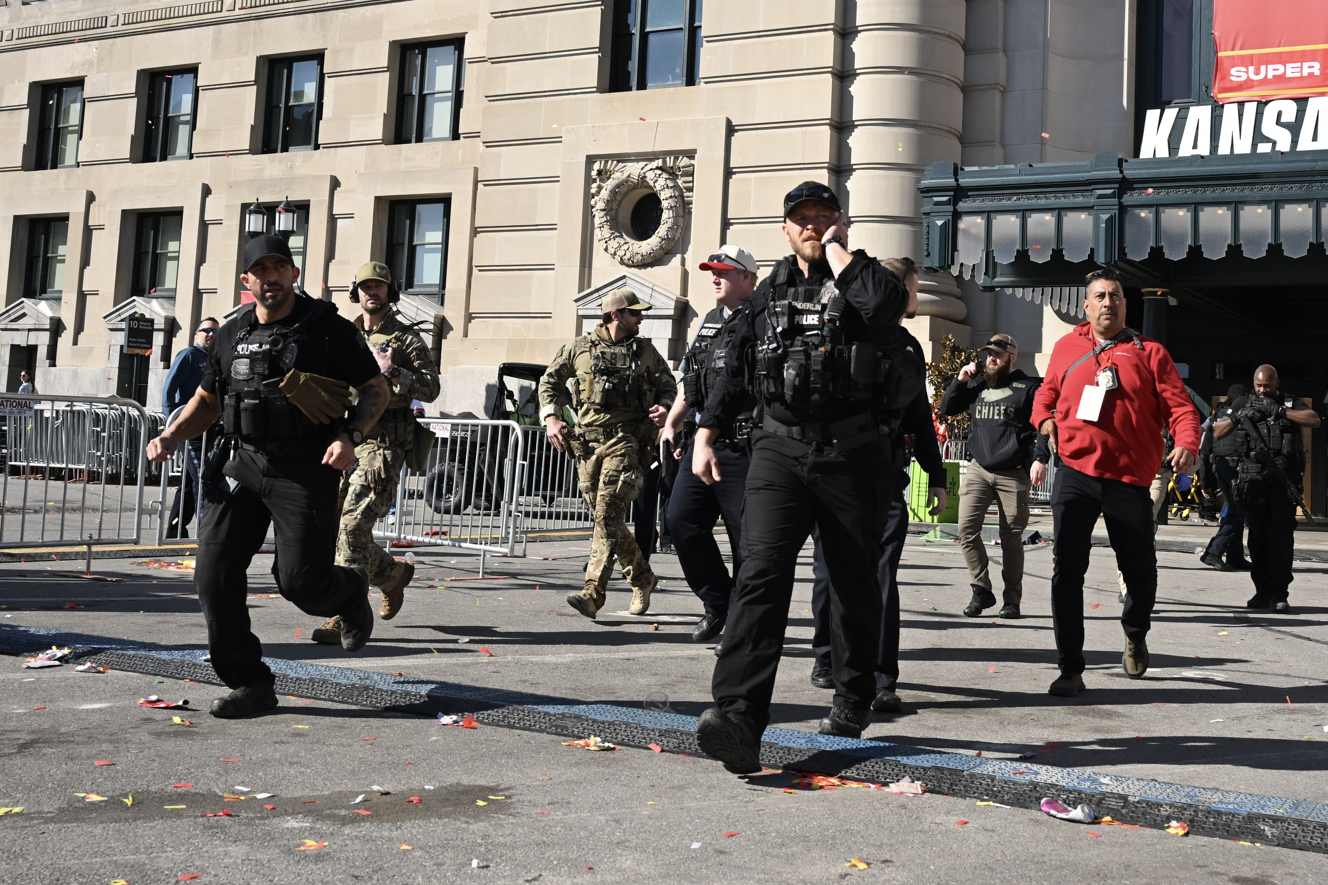 Police and security detail responding to the shooting incident at the Super Bowl LVIII victory parade in Kansas City, Missouri on February 14, 2024 | Source: Getty Images