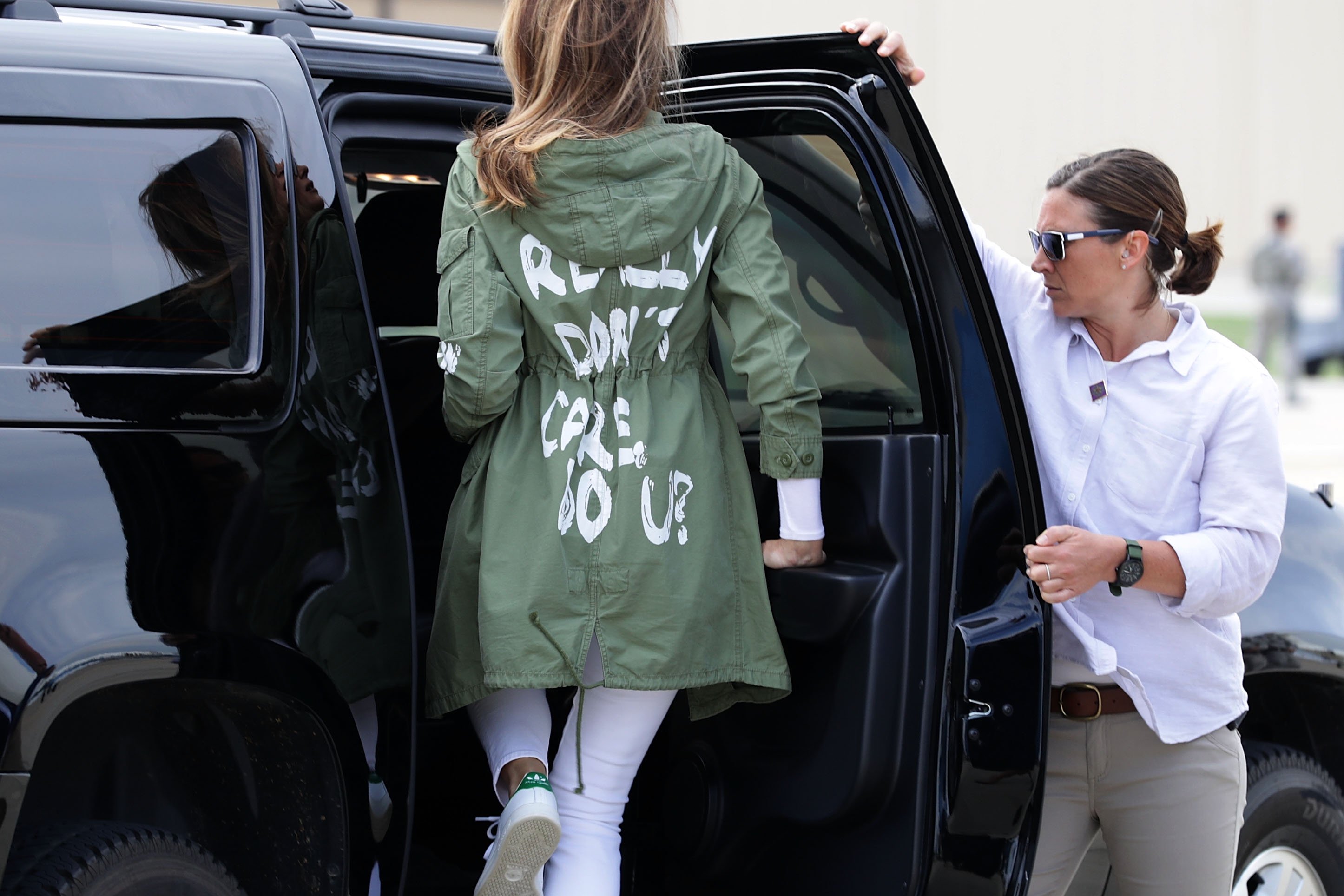 U.S. first lady Melania Trump climbs back into her motorcade after traveling to Texas to visit facilities that house and care for children taken from their parents at the U.S.-Mexico border June 21, 2018, at Joint Base Andrews, Maryland. | Source: Getty Images.