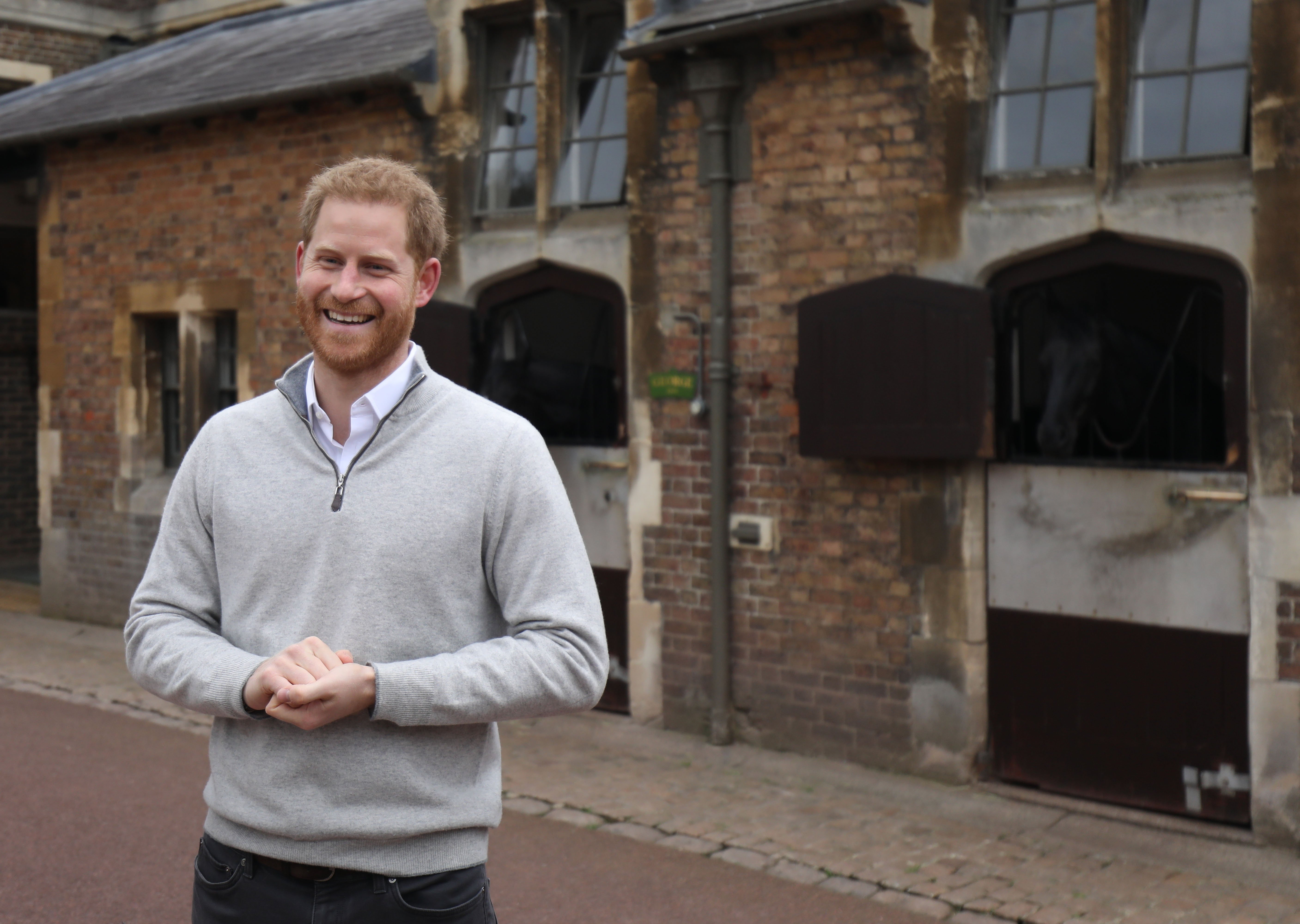 Prince Harry talking to the media about the birth of his first son at Windsor Castle | Photo: Getty Images