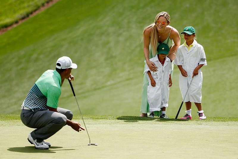 Tiger Woods, his then-girlfriend Lindsey Vonn, his son Charlie and his daughter Sam at Augusta National Golf Club on April 8, 2015 in Augusta, Georgia | Photo: Getty Images
