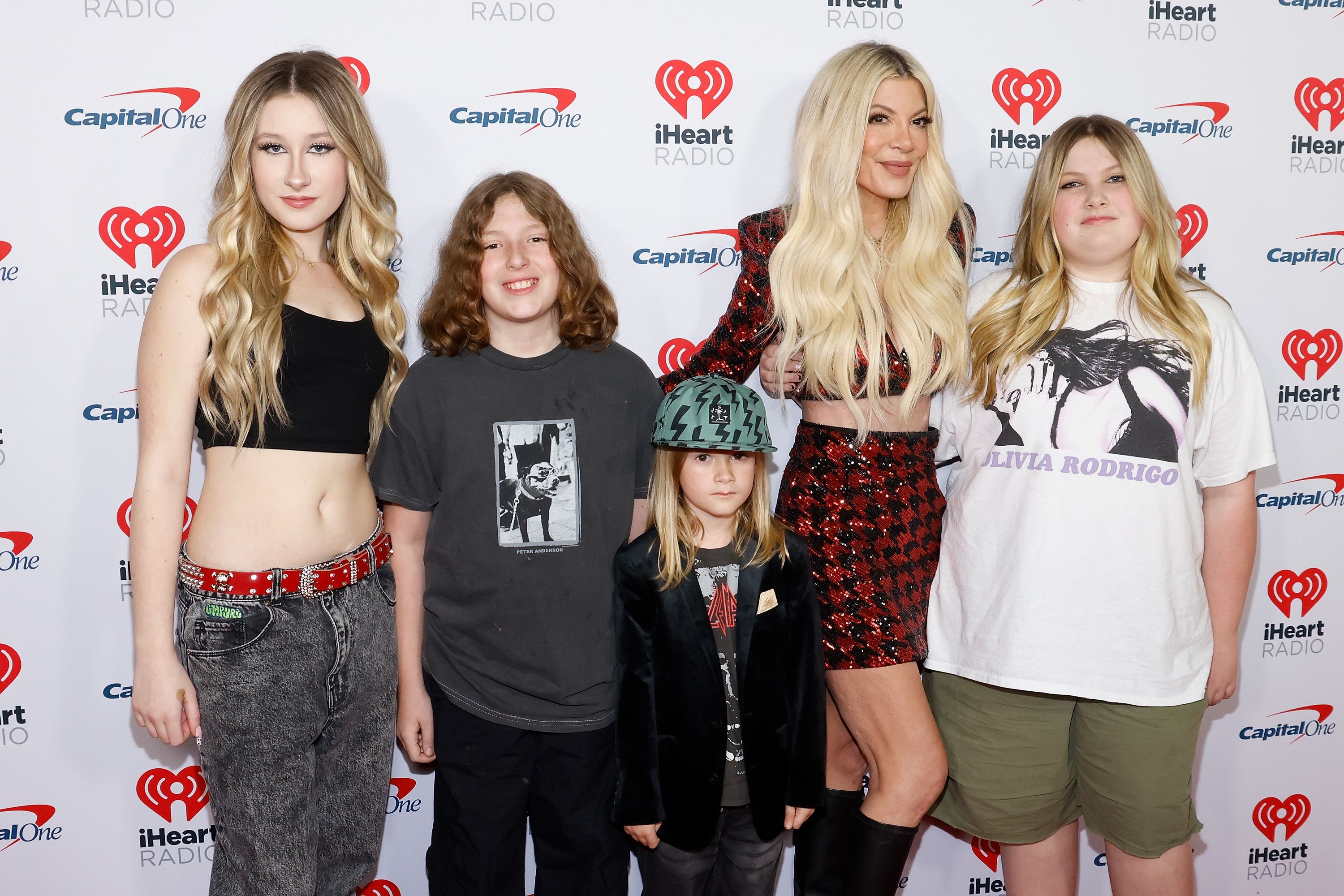 Tori Spelling, and her kids Stella Doreen, Finn, Beau, and Hattie McDermott attend the KIIS FM's iHeartRadio Jingle Ball 2023 Presented By Capital One at The Kia Forum on December 01, 2023 in Inglewood, California. | Source: Getty Images