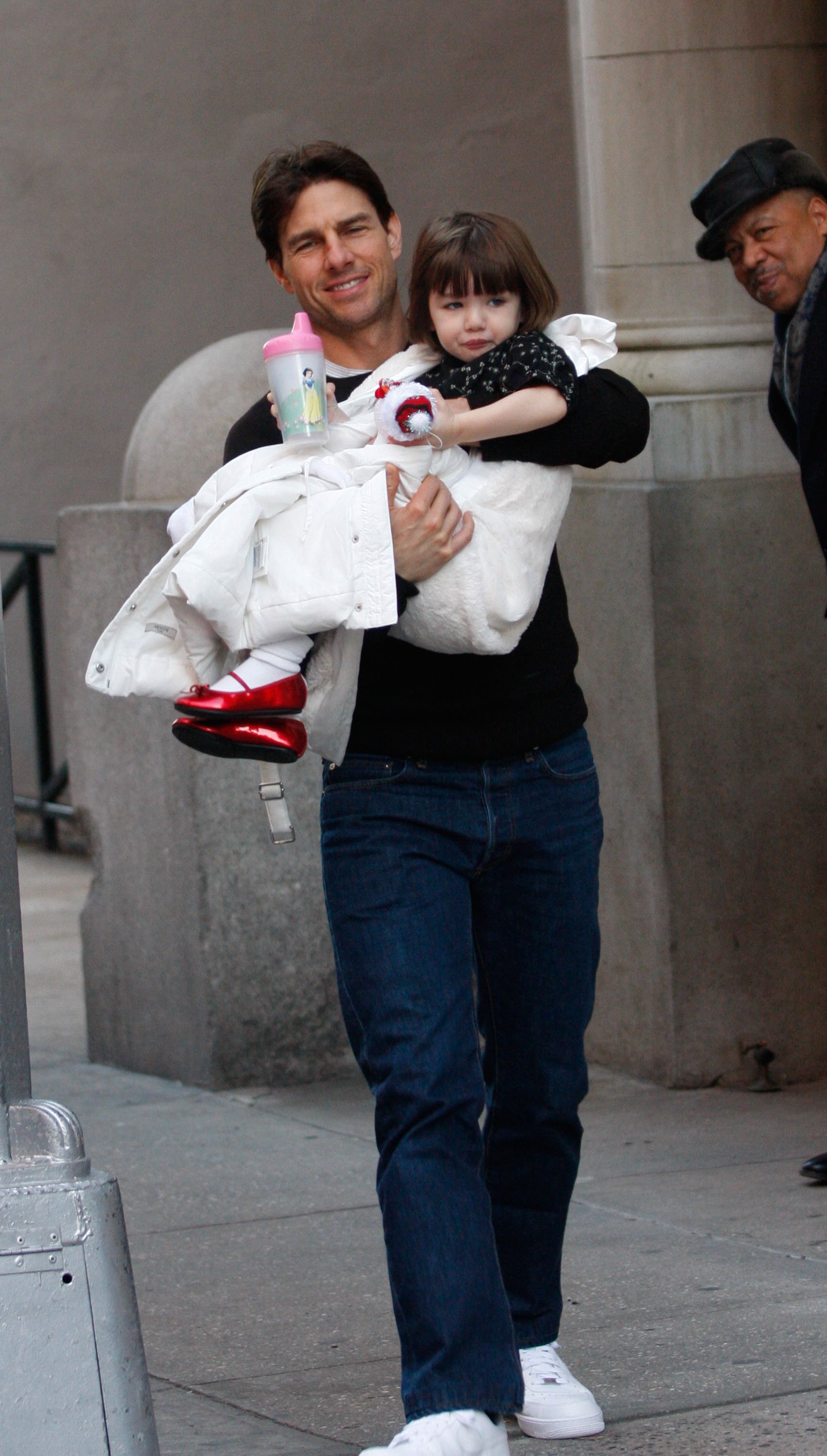 Tom Cruise and Suri Cruise in Manhattan on December 3, 2008 in New York City | Source: Getty Images