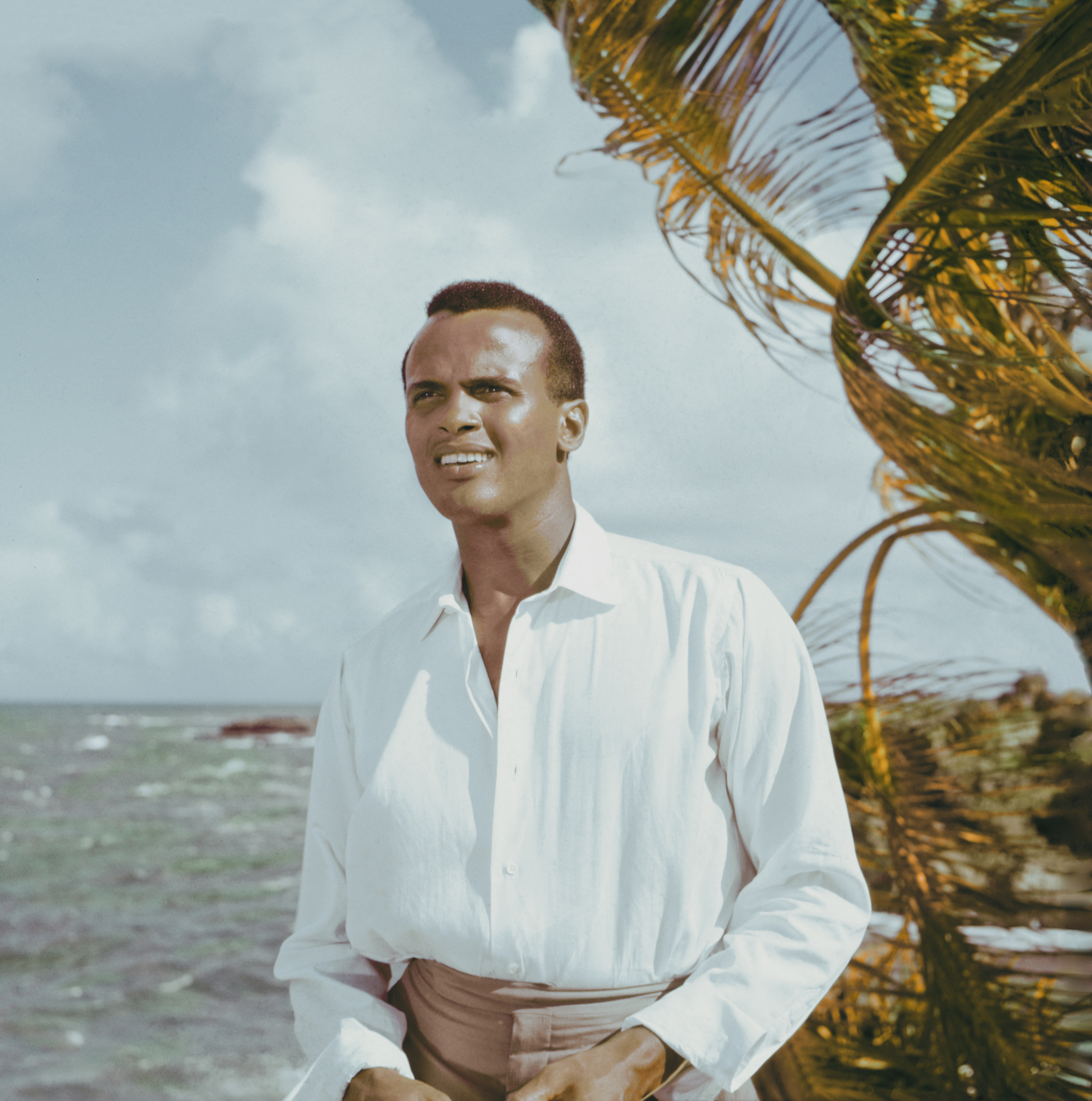 American actor and singer Harry Belafonte on a beach, circa 1957. | Source: Getty Images