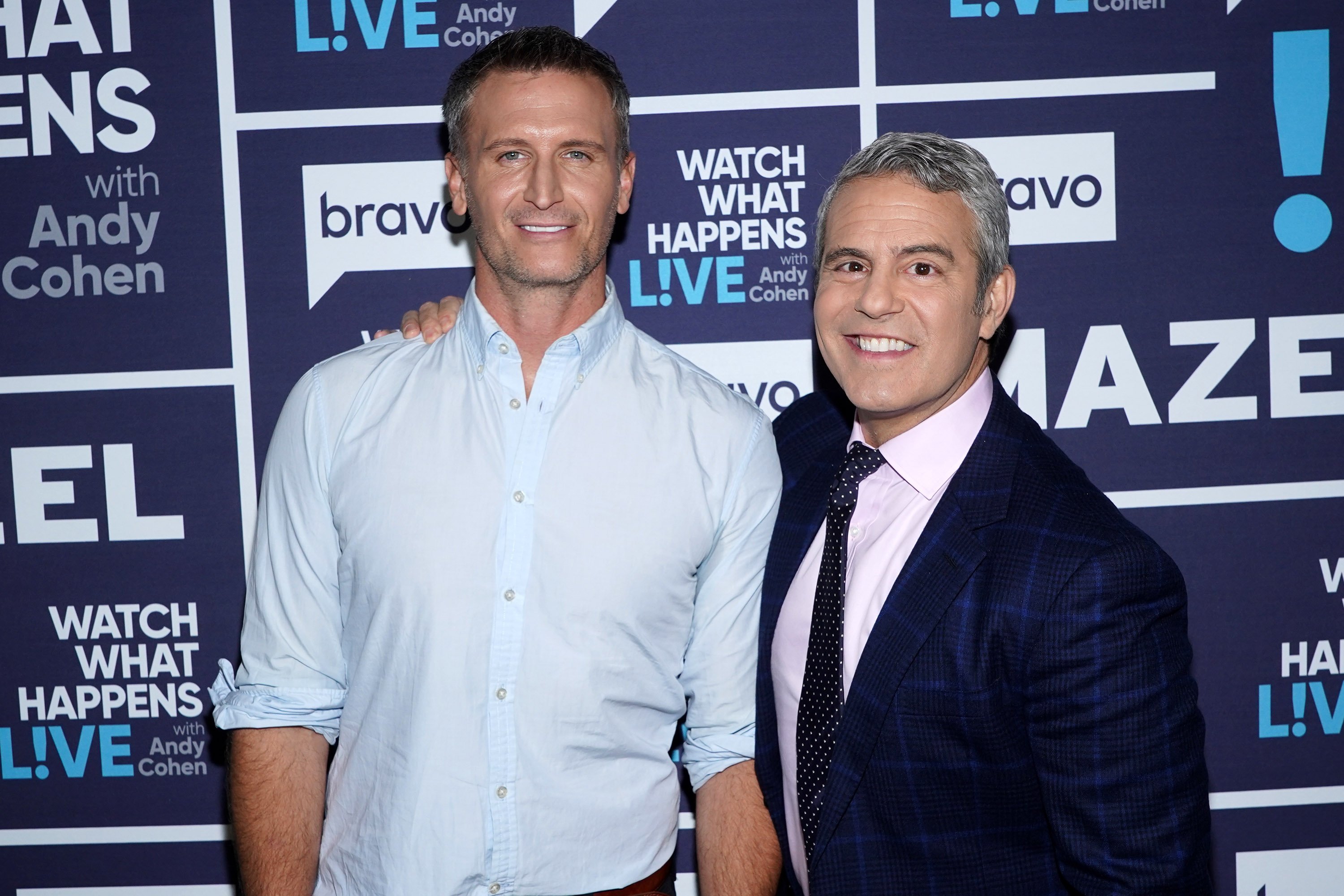 Andy Cohen and John Hill on the set of his show "Watch What Happens Live With Andy Cohen" on November 2, 2021 | Source: Getty Images