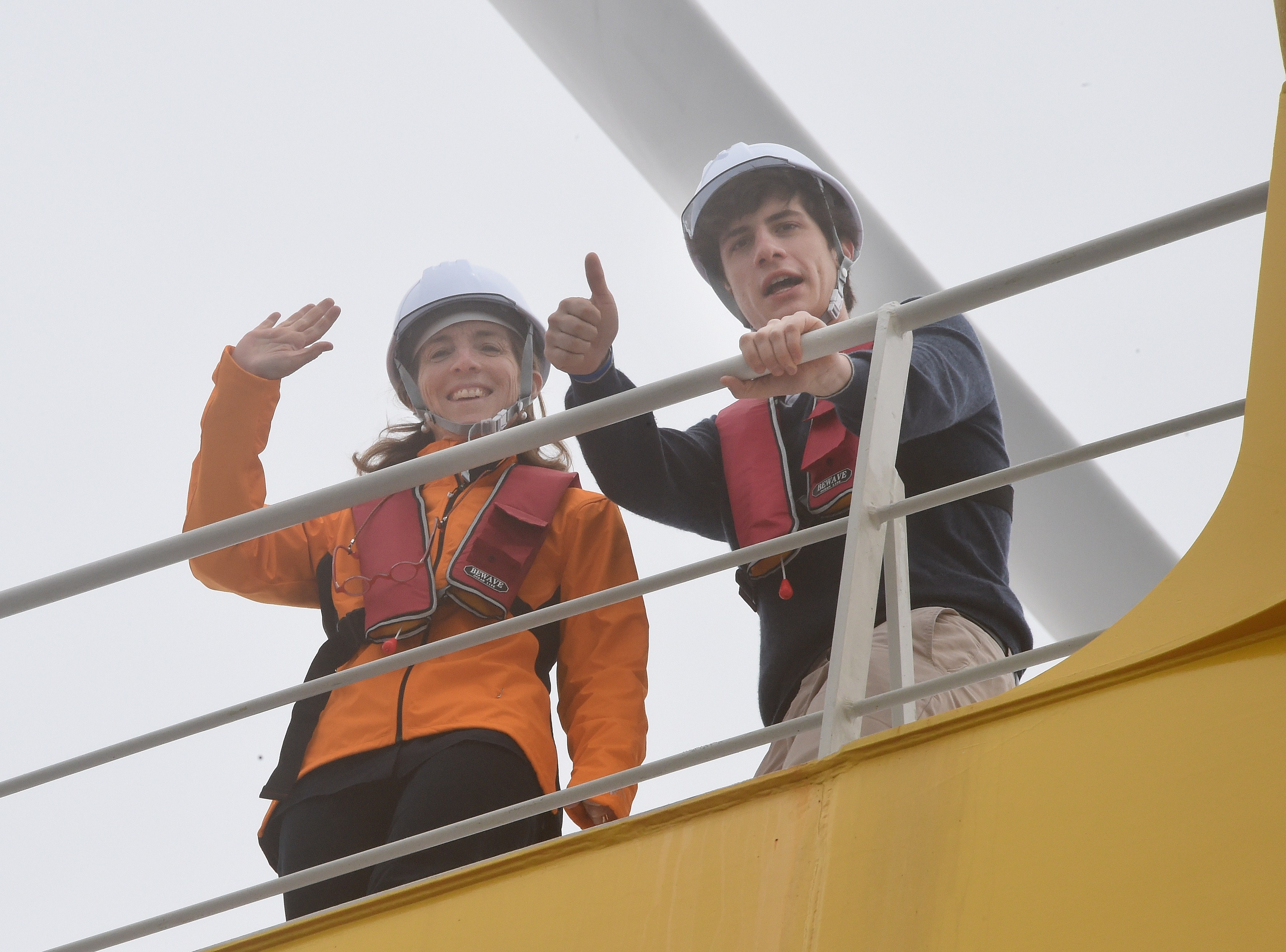 Caroline Kennedy and Jack Schlossberg on an offshore wind turbine in the sea off the coast of the town of Naraha in Fukushima prefecture, Japan, on May 15, 2014. | Source: Getty Images