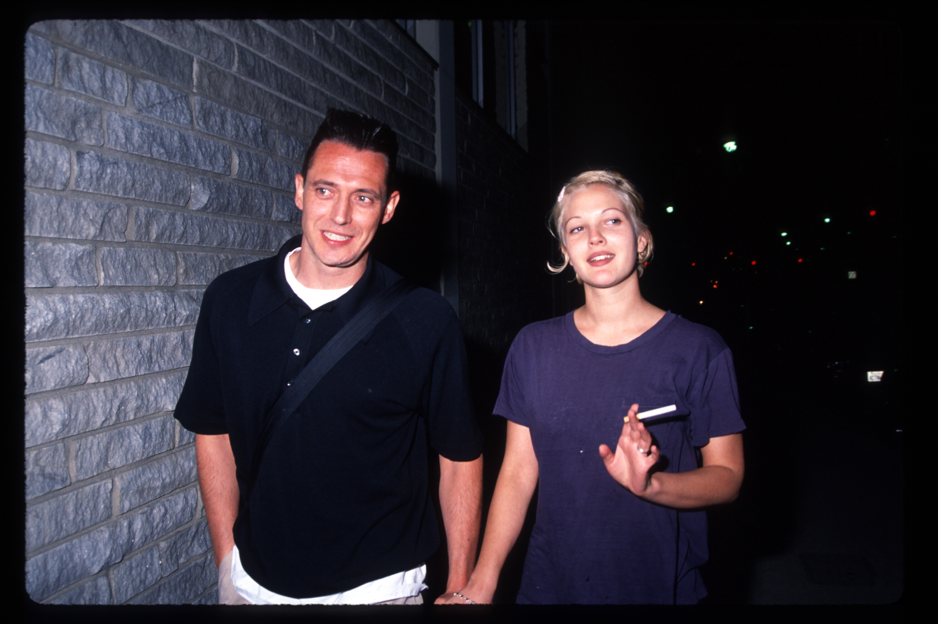 Jeremy Thomas and Drew Barrymore at the premiere of "Bad Girls" on April 19, 1994, in Los Angeles, California. | Source: Getty Images