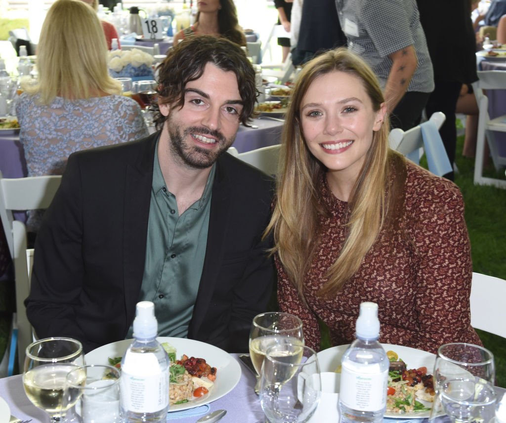 Robbie Arnett and Elizabeth Olsen attend The Rape Foundation's Annual Brunch on October 8, 2017 | Photo: Getty Images