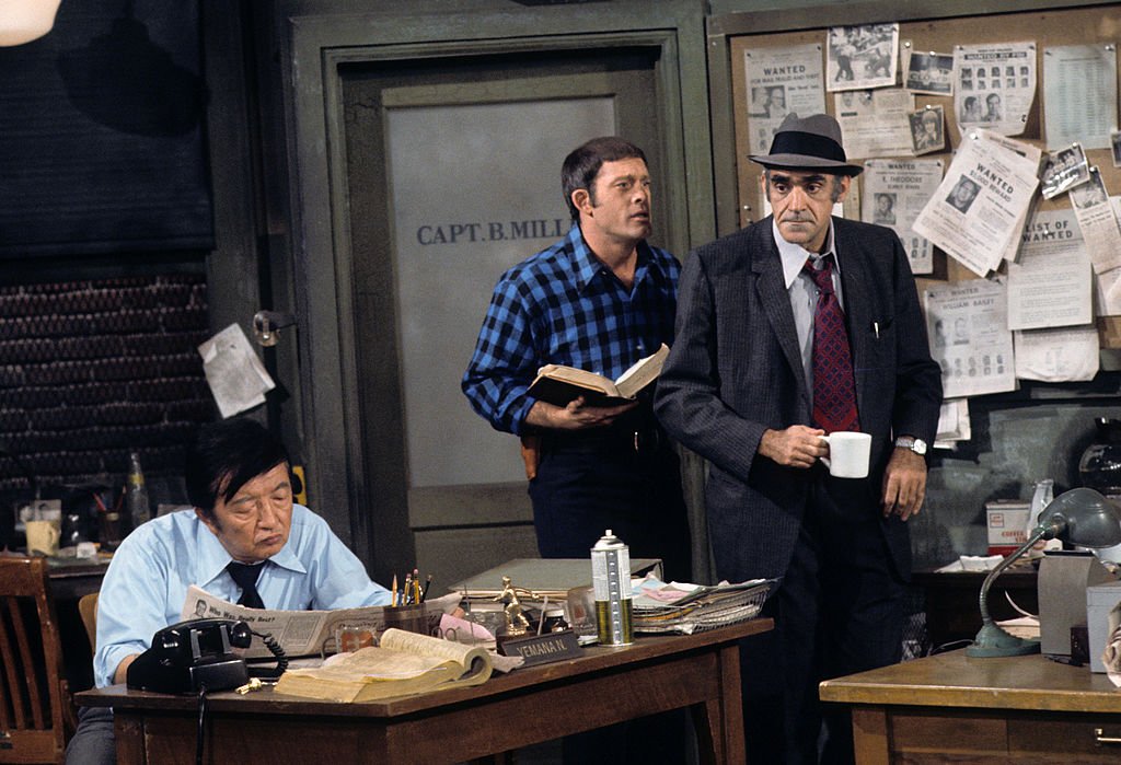 Jack Soo, whose real name was Goro Suzuki, is seen on set with Max Gail and Abe Vigoda in the 1975 series "Barney Miller." | Photo: Getty Images