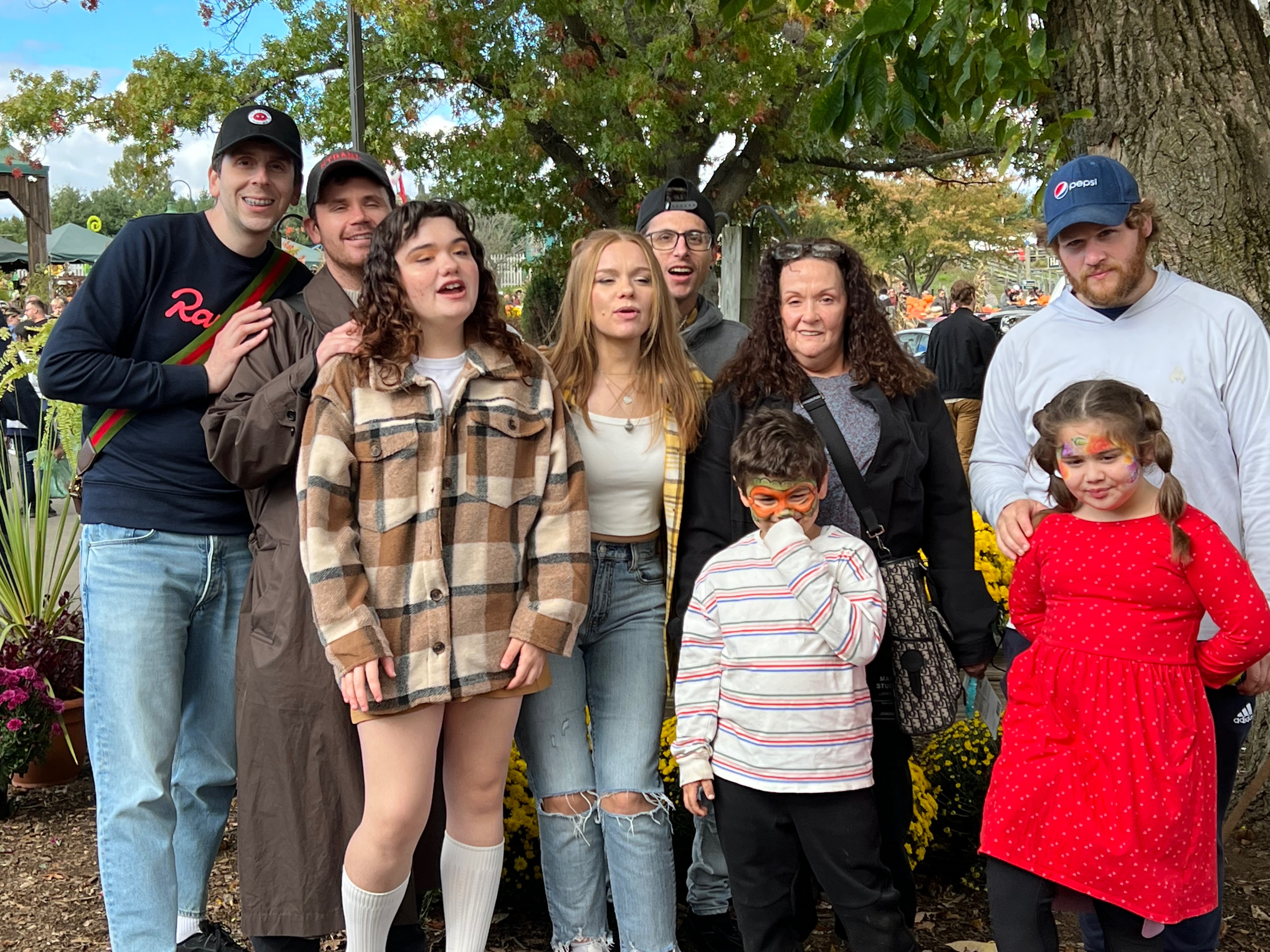 A photo of Thomas Maltezos and Brandon O'Brien (far L) with loved ones. | Source: GoFundMe