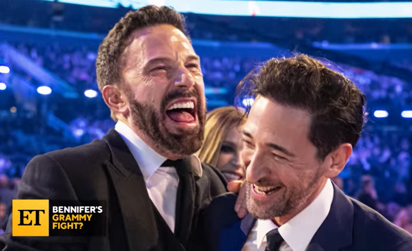 Ben Affleck laughs with Adrien Brody at the 2023 Grammys, dated February 8, 2023 | Source: YouTube/@EntertainmentTonight