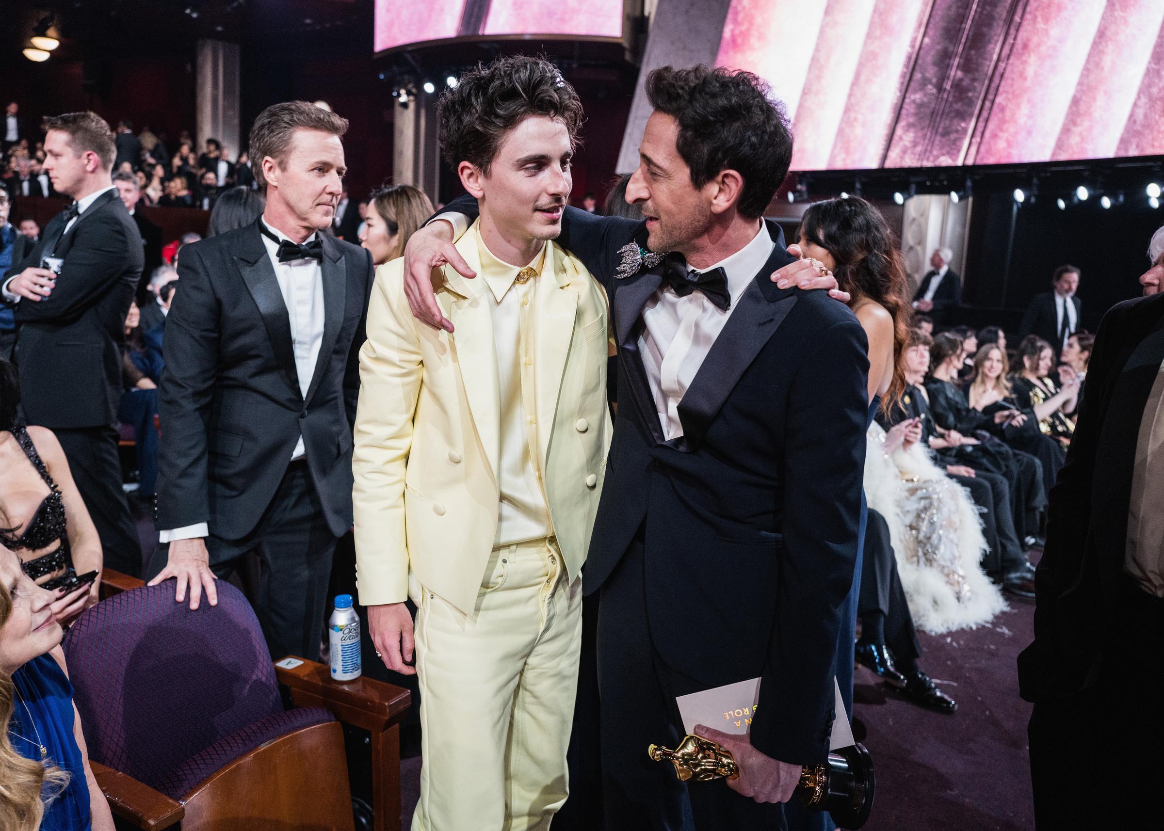 Timothée Chalamet and Adrien Brody sharing a moment at this year's Oscars. | Source: Getty Images