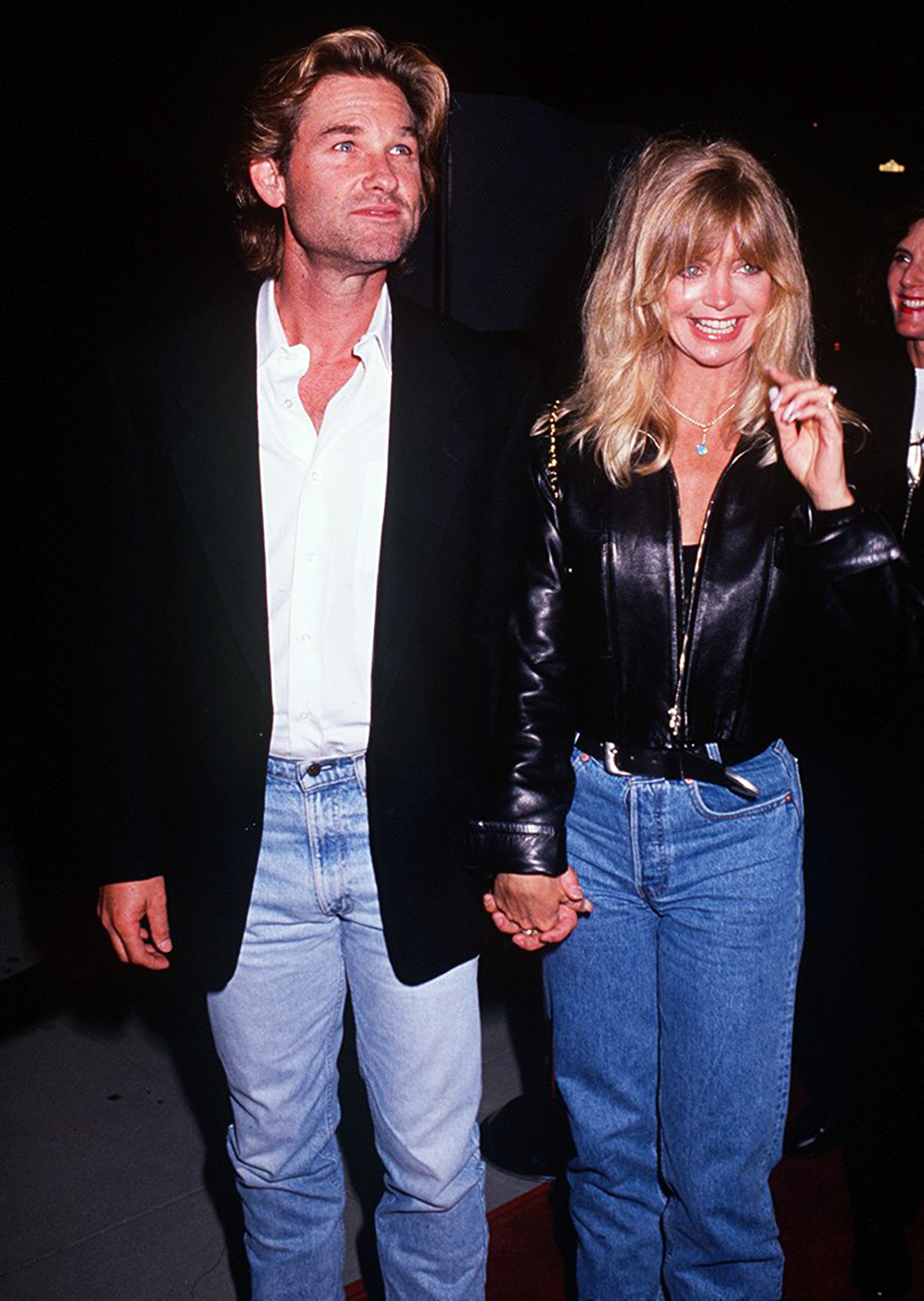 American actress Goldie Hawn with her partner, actor Kurt Russell at the "Housesitter" Beverly Hills premiere at the Academy Theatre on June 9,1992 in Beverly Hills, California | Source: Getty Images