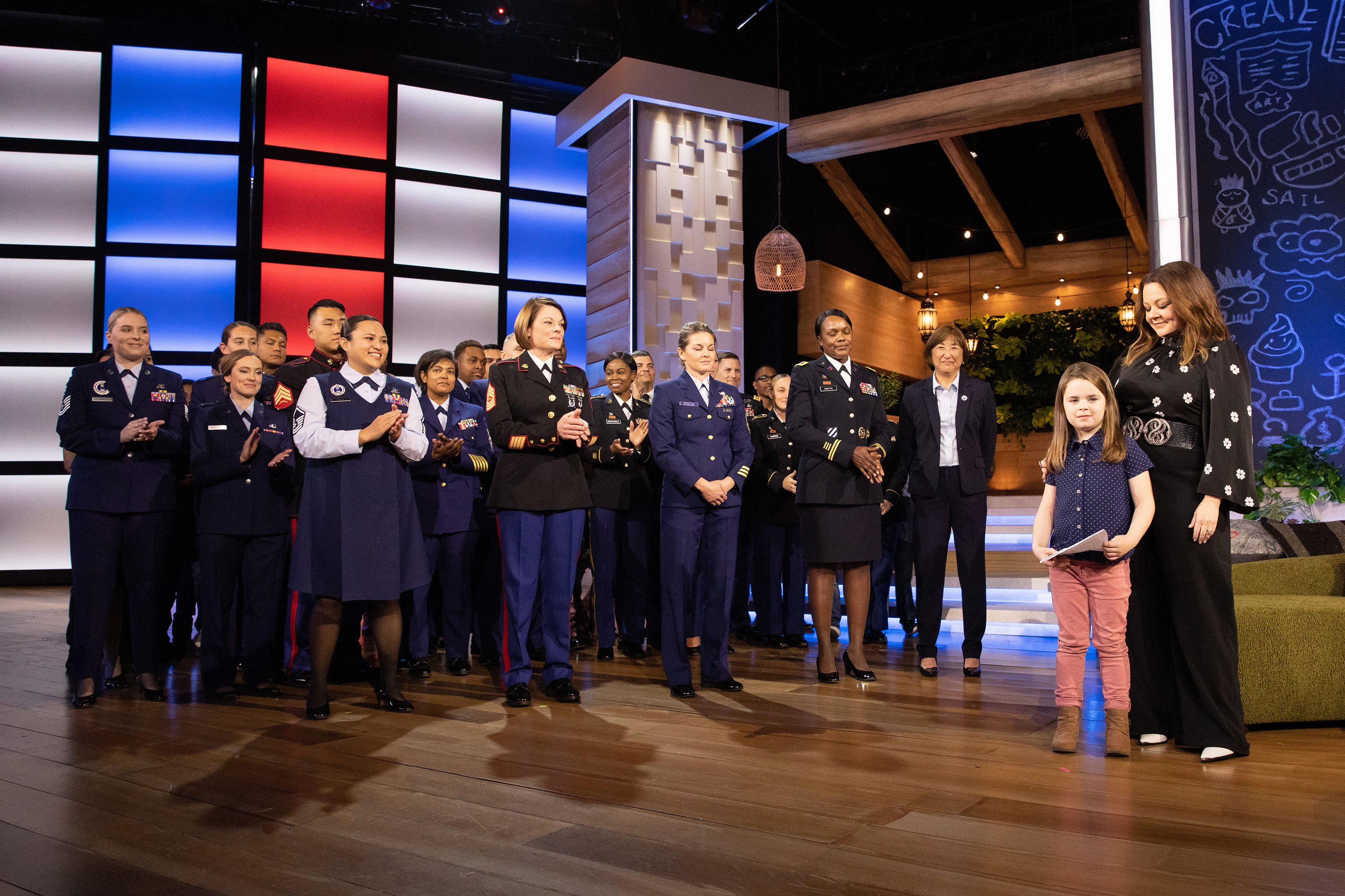 Representatives of the US Military, Vivian Falcone, and Melissa McCarthy on "Little Big Shots with Melissa McCarthy" on April 23, 2020. | Source: Getty Images