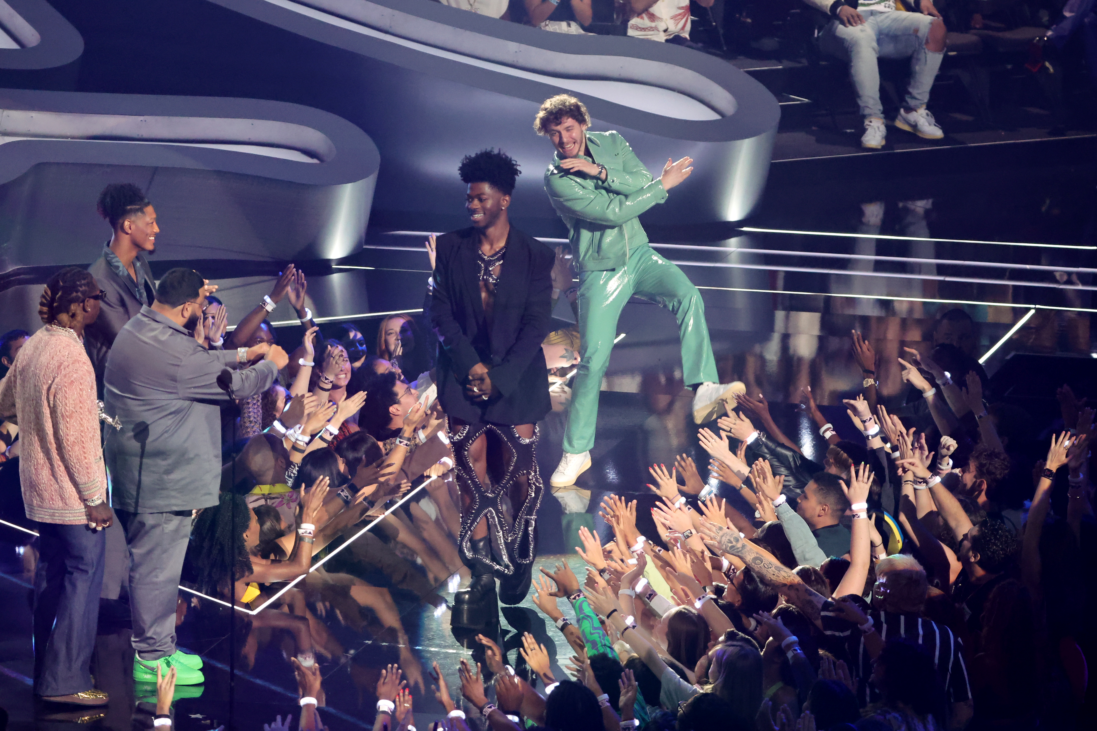 Lil Nas X and Jack Harlow accept an award onstage at the 2022 MTV VMAs at Prudential Center on August 28, 2022 in Newark, New Jersey. | Source: Getty Images