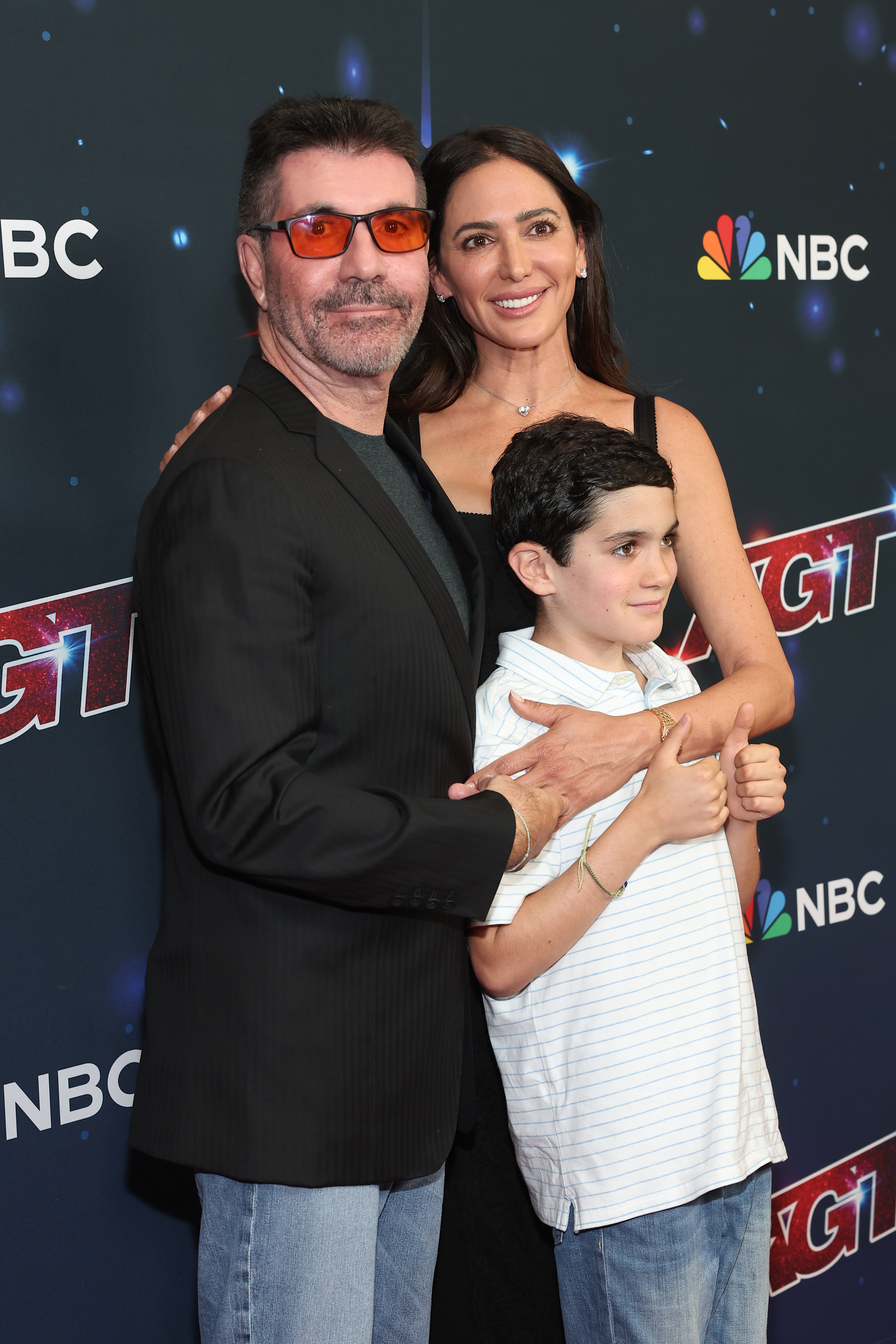 Simon Cowell and Lauren Silverman with their son Eric Cowell at the "America's Got Talent" Season 18 finale on September 27, 2023 | Source: Getty Images