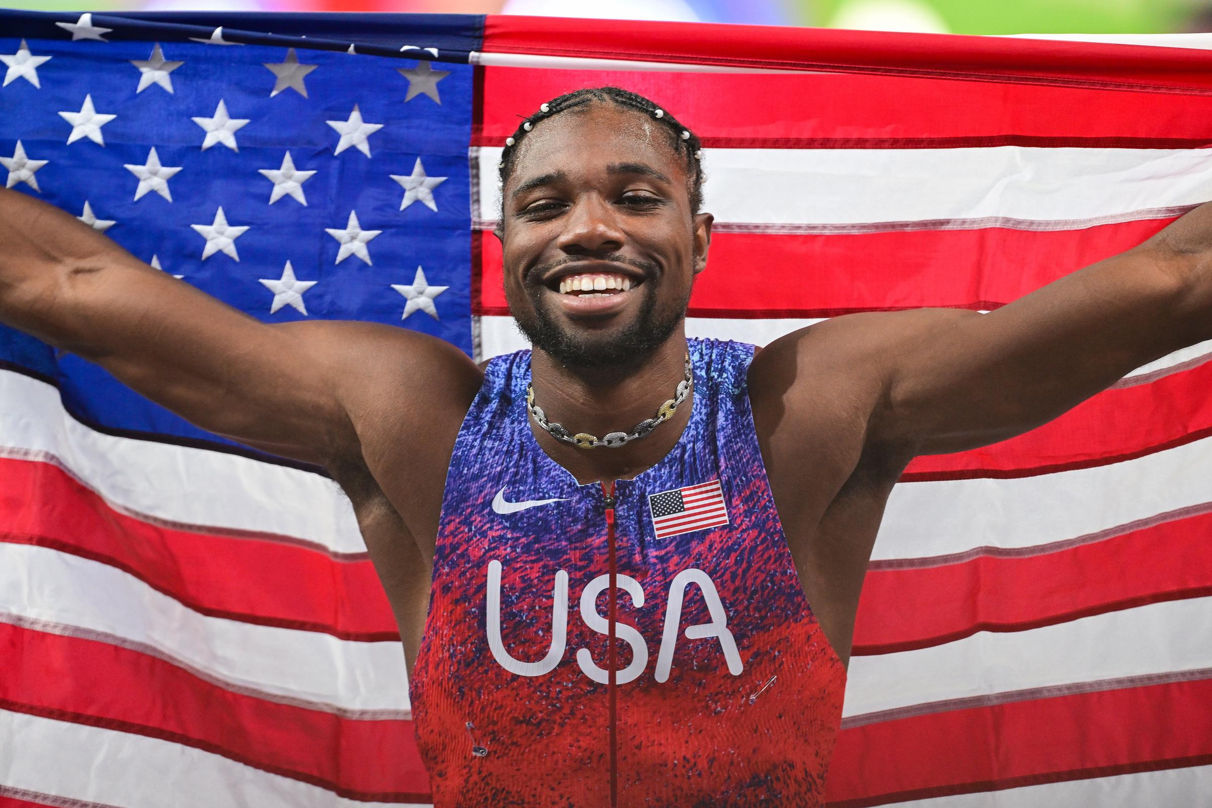 Noah Lyles celebrates winning the gold medal after competing the Men's 100m Final at the Olympic Games Paris 2024 in Paris, France, on August 4, 2024. | Source: Getty Images