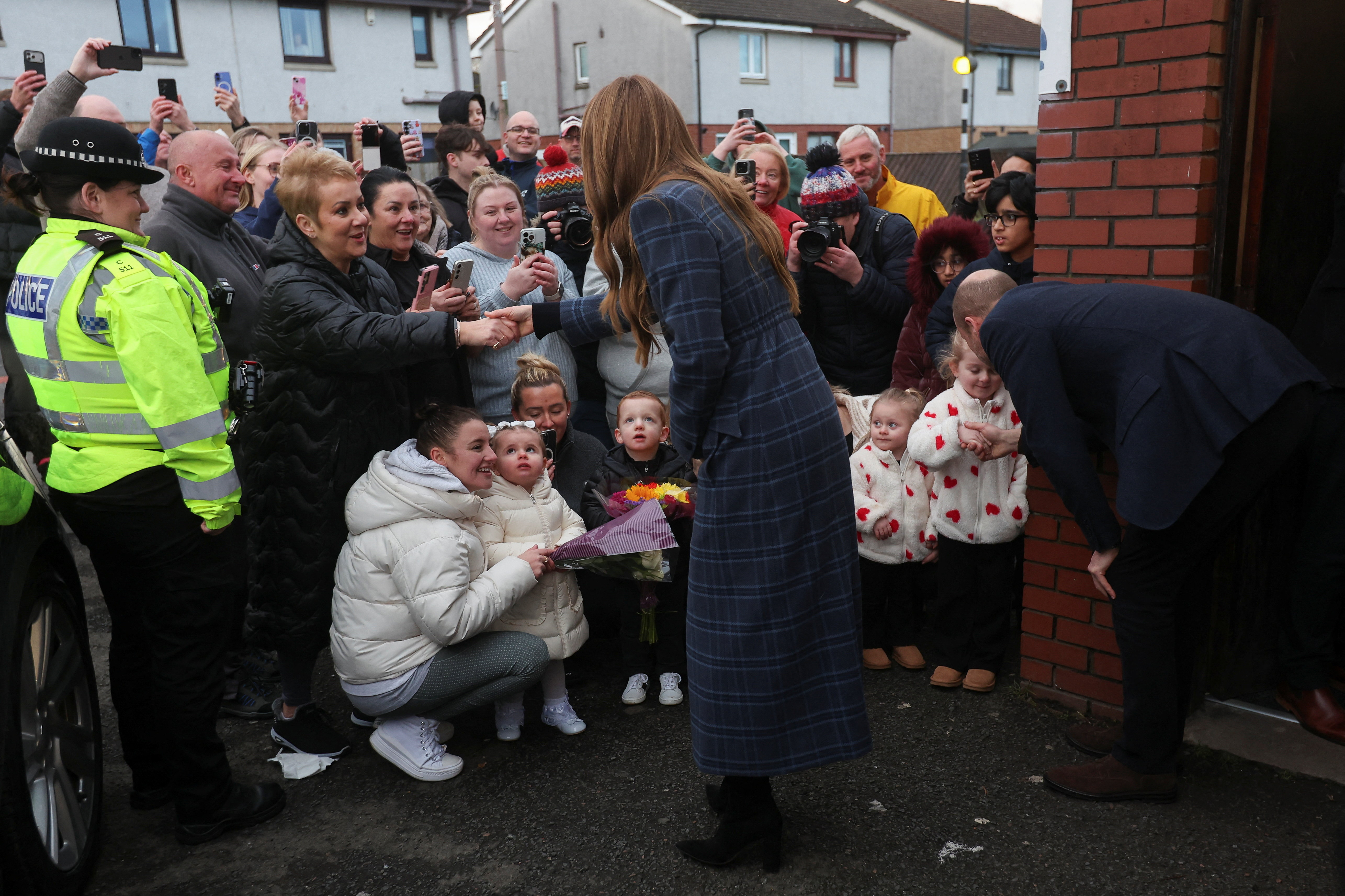 Prince William and Princess Catherine greet children as they visit The Gothenburg, known locally as "The Goth," on 20 January 2026 in Stirling, Scotland. | Source: Getty Images