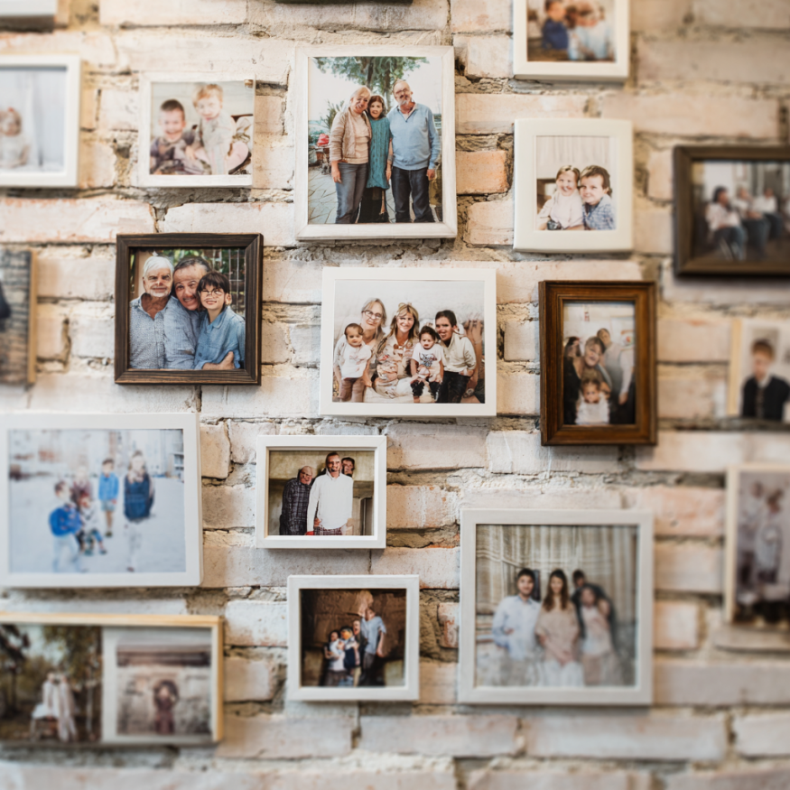A wall of family photos | Source: Midjourney