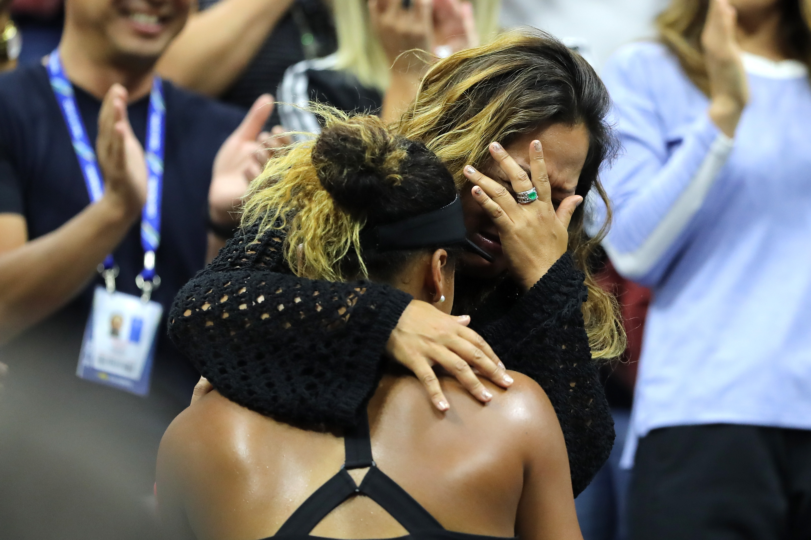 Tamaki Osaka hugs Naomi Osaka during the 2018 US Open in New York City on September 8, 2018 | Source: Getty Images