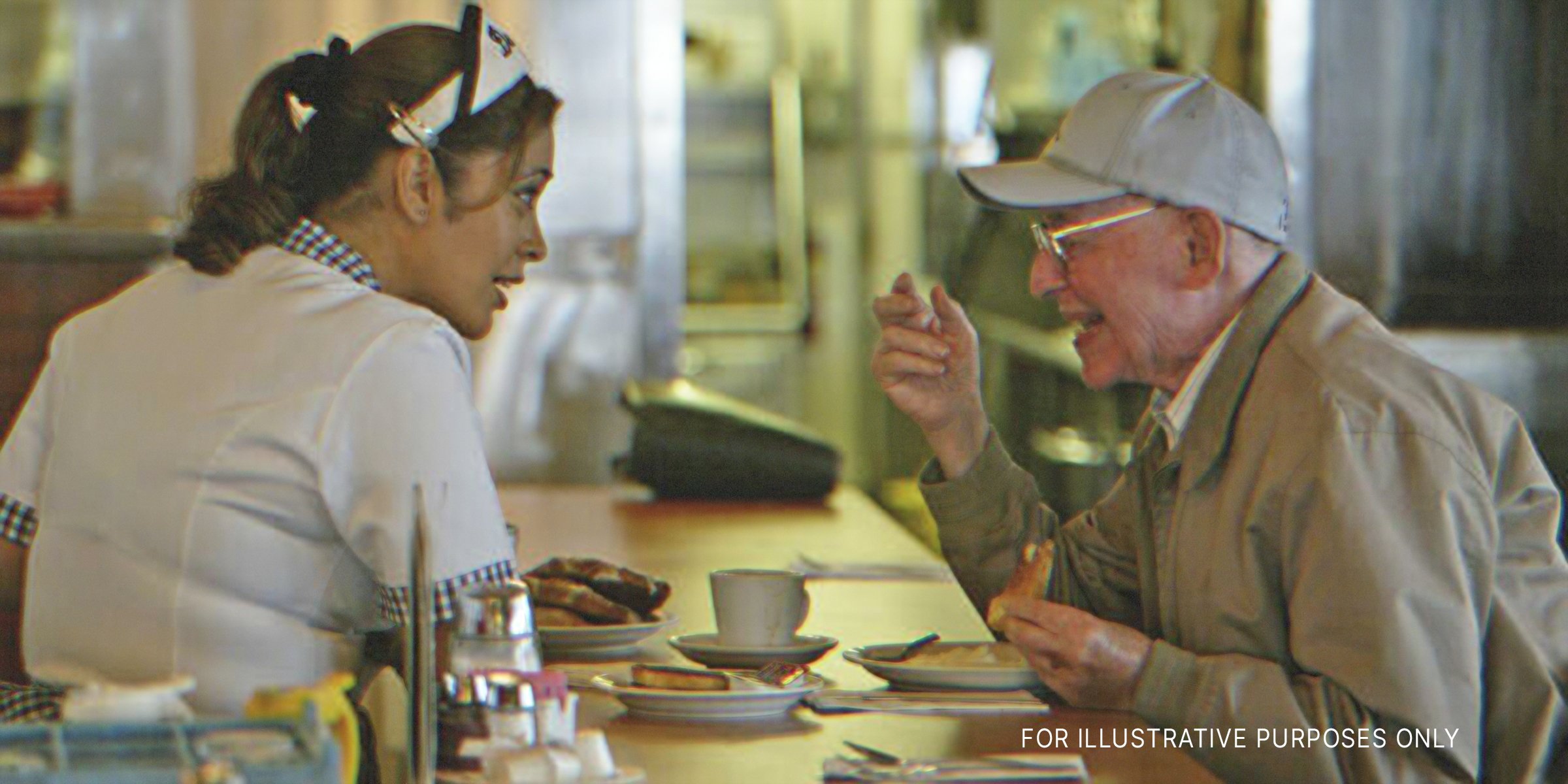 Waitress talking to old man. | Source: Getty Images