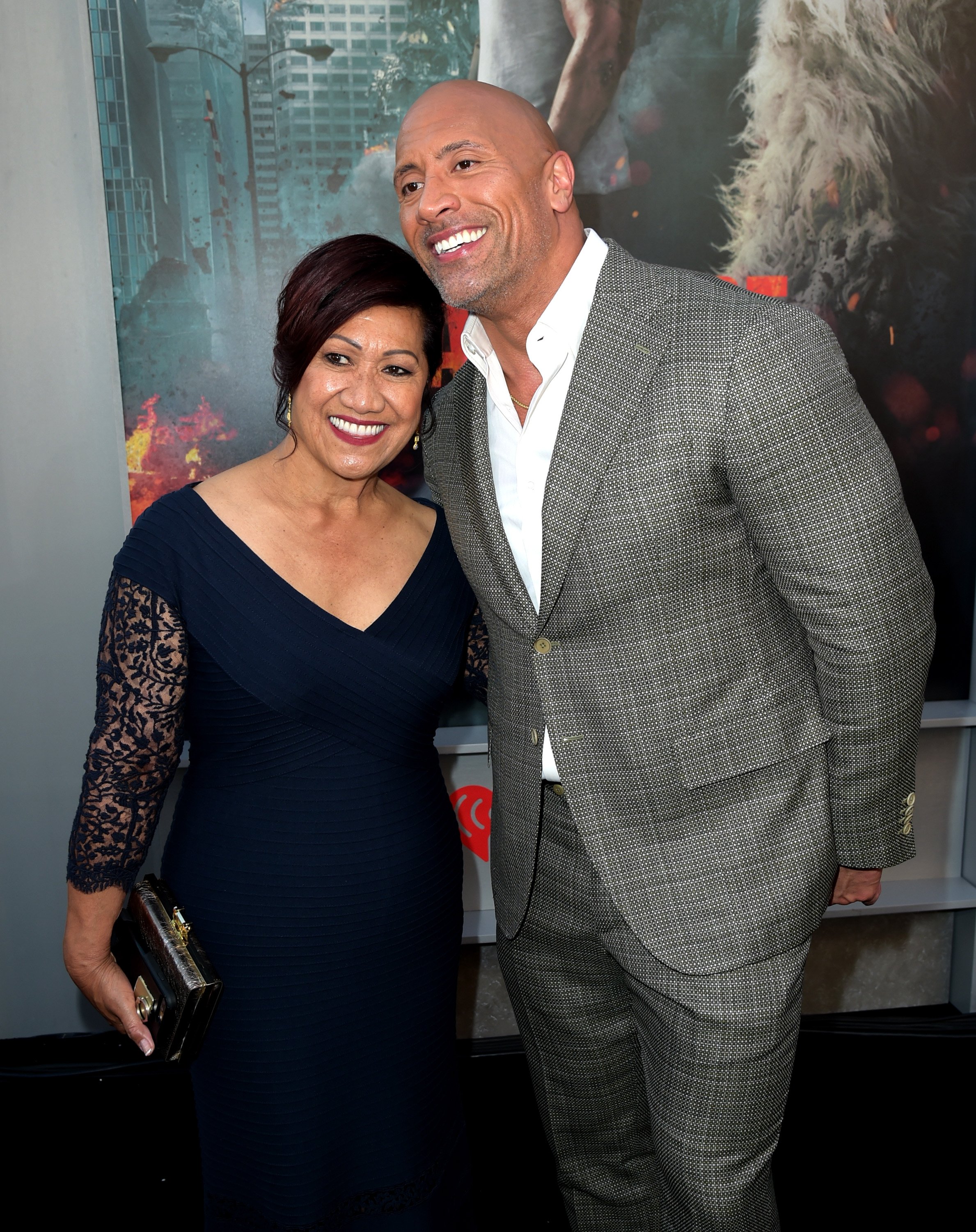 Actor Dwayne Johnson (R) and his mother, Ata Johnson, arrive at the premiere of Warner Bros. Pictures' "Rampage" at the Microsoft Theatre on April 4, 2018 in Los Angeles, California. | Source: Getty Images
