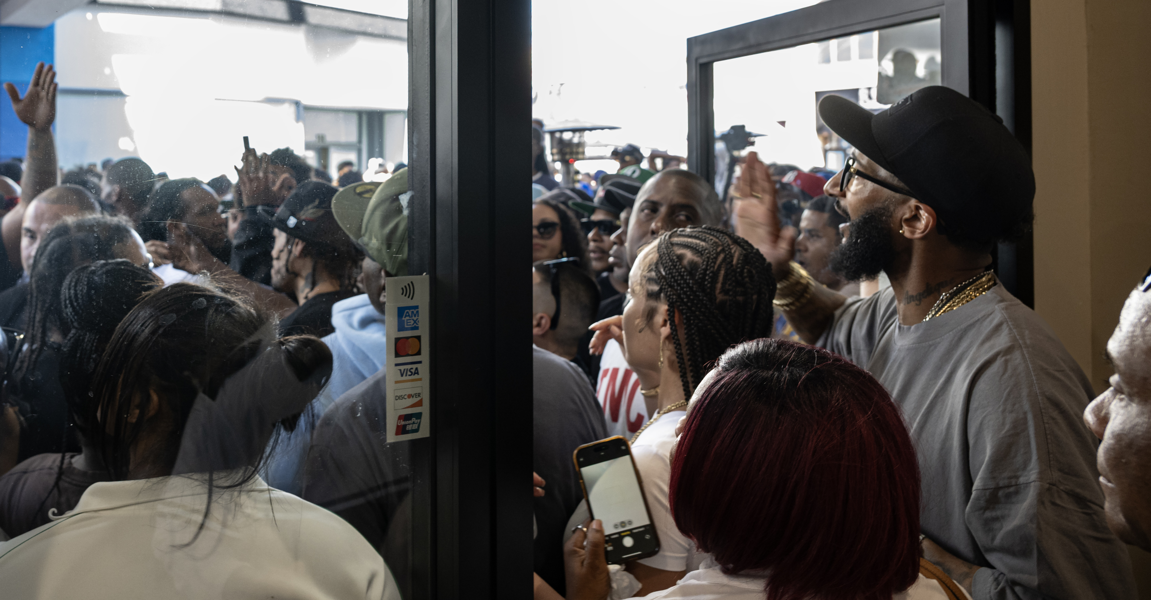 Blacc Sam, the brother of late rapper Nipsey Hussle, temporarily clears out the new Marathon Burger restaurant in downtown Long Beach on Sunday, March 1, 2026 | Source: Getty Images