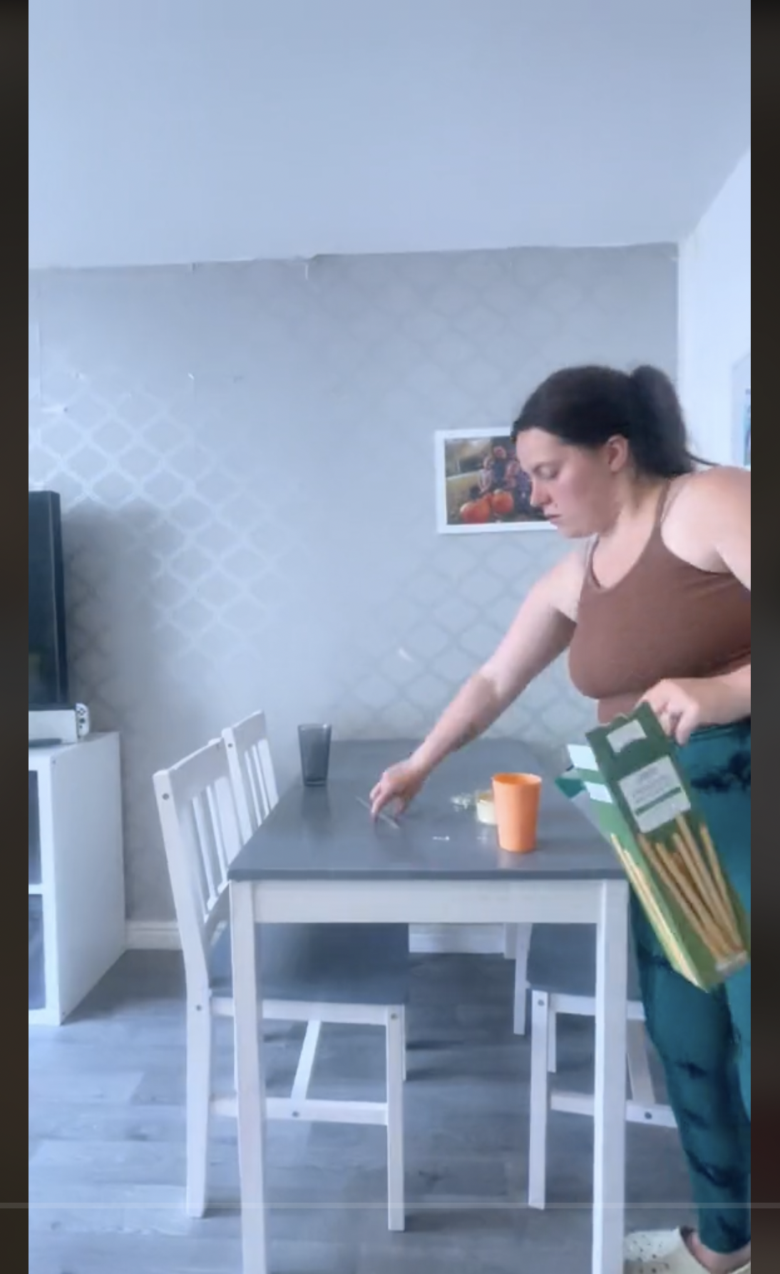 Nicole Austin is pictured cleaning her house, as seen in a clip dated June 4, 2024 | Source: TikTok/@theaustins_1