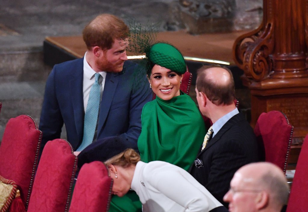 Prince Harry sit next to Meghan Markle as she enjoyed a chat with Prince Edward, who sat next to his wife Sophie, Countess of Wessex during the Commonwealth Day Service 2020 on March 9, 2020 in London, England | Source: Phil Harris - WPA Pool/Getty Images