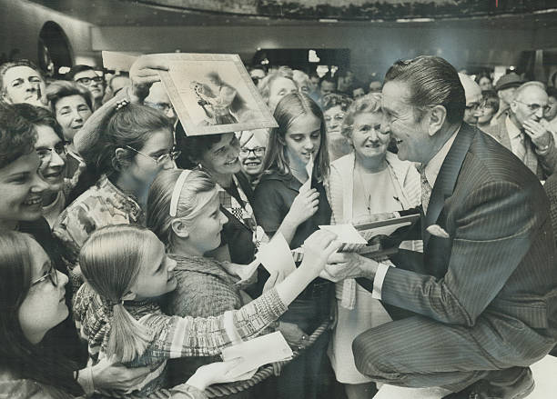Banlender Lawrence Welk autographs his book Wunnerful; Wunnerful at Sherway Gardens, Canada on September 24, 1971 | Source: Getty Images