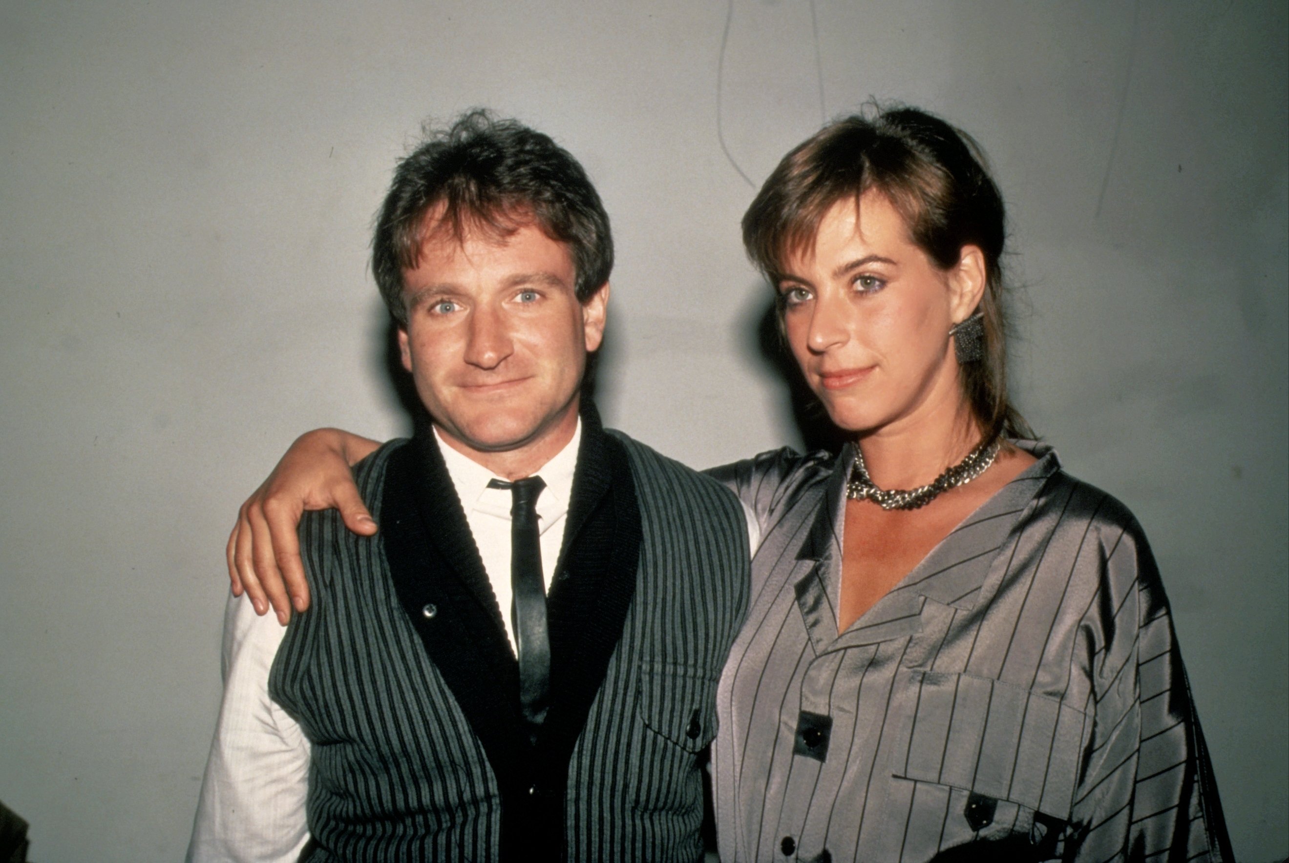 Actor Robin Williams and his wife Valerie Velardi pictured in 1984 in New York ┃Source: Getty Images