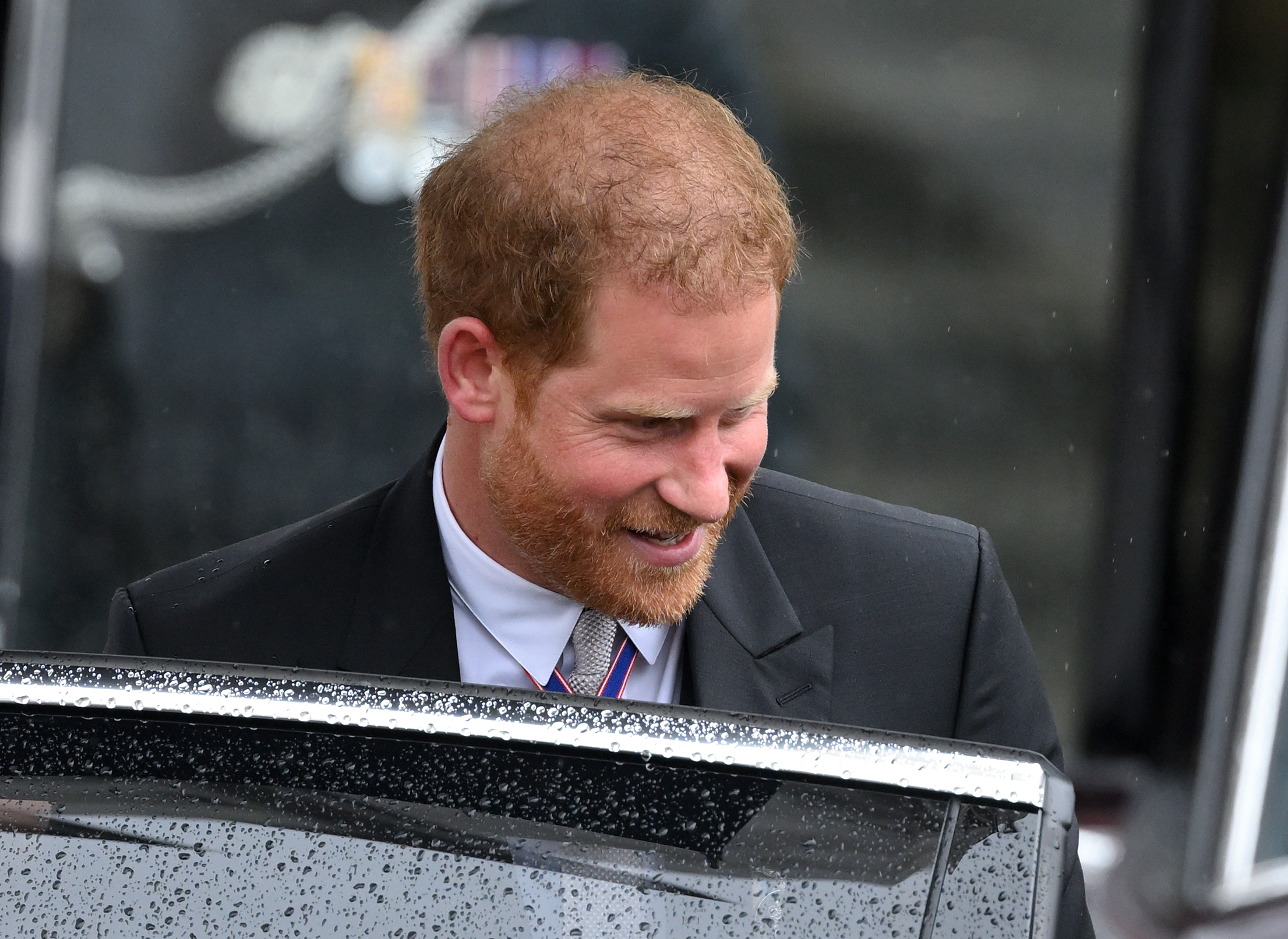 Prince Harry departs Westminster Abbey after the Coronation of King Charles III and Queen Camilla on May 06, 2023 in London, England. | Source: Getty Images
