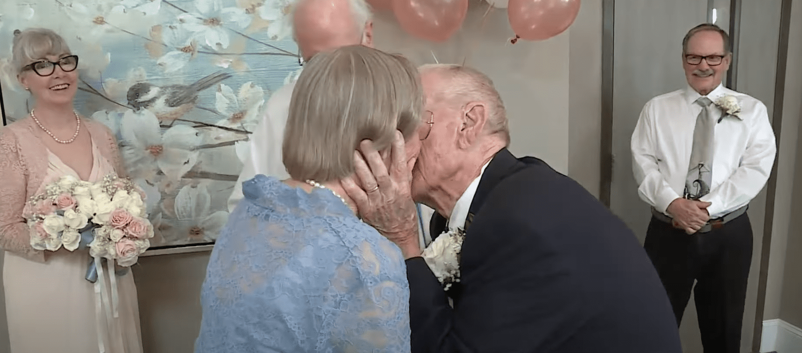 Carl Hammer and Reva Truitt sharing a kiss on their wedding day | Source: youtube.com/CBS Sacramento