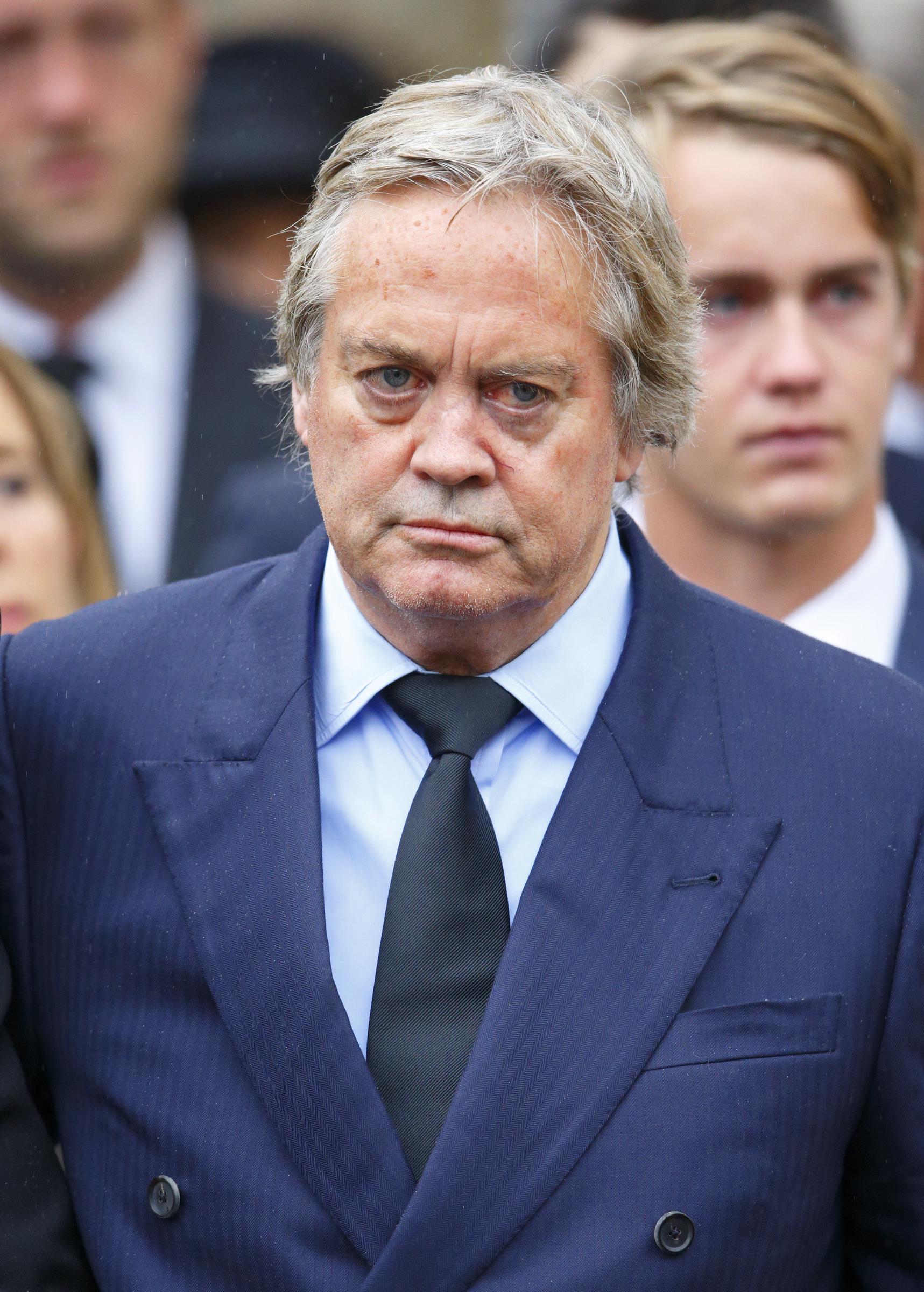 Charles James Spencer-Churchill, also known as Jamie Blandford, 12th Duke of Marlborough, at the funeral of his father, John Spencer-Churchill, the 11th Duke of Marlborough, at the church of St. Mary Magdalene on October 24, 2014, in Woodstock, England. | Source: Getty Images