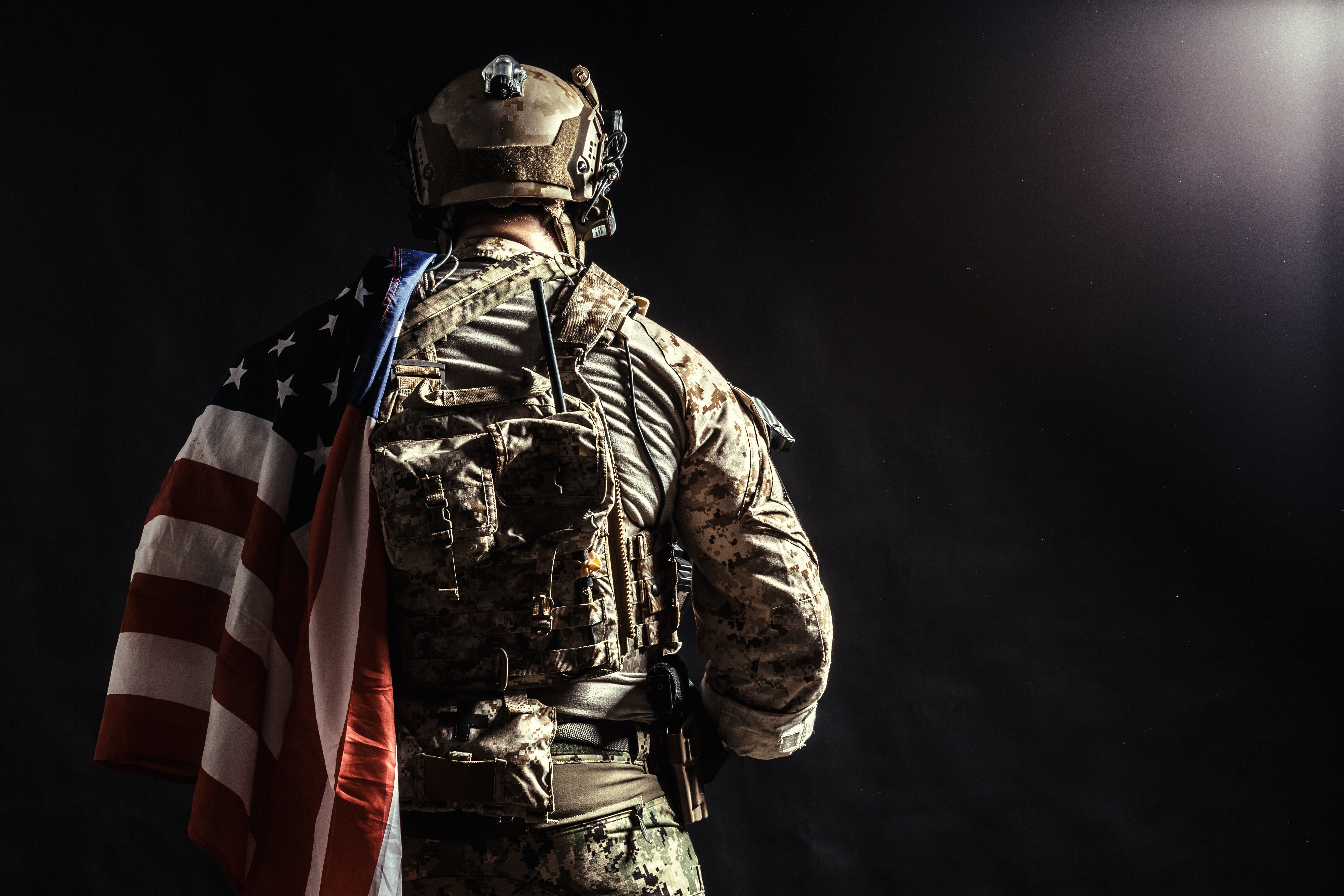A soldier with the United States of America (U.S.A.) flag on his shoulder. │Source: Shutterstock
