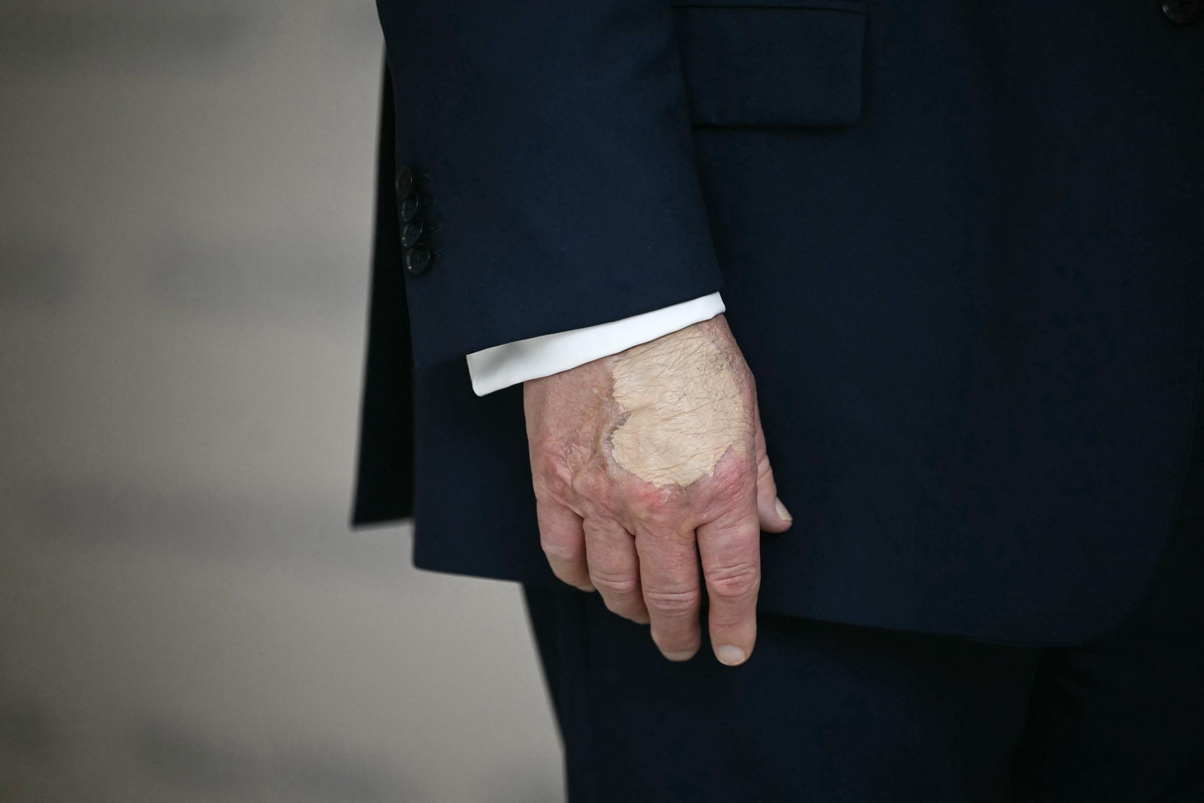 Donald Trump's hand is seen as he speaks at "The People's House," on August 22, 2025, in Washington, DC. | Source: Getty Images