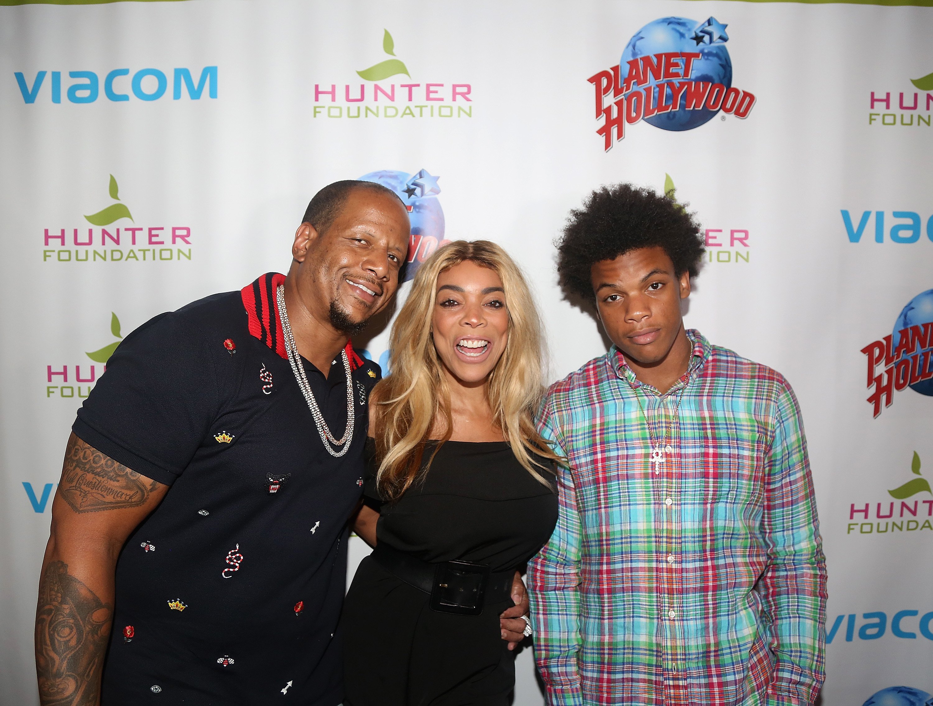 Kevin Hunter, Wendy Williams and son Kevin Hunter Jr pose at a celebration for The Hunter Foundation Charity. | Photo: GettyImages