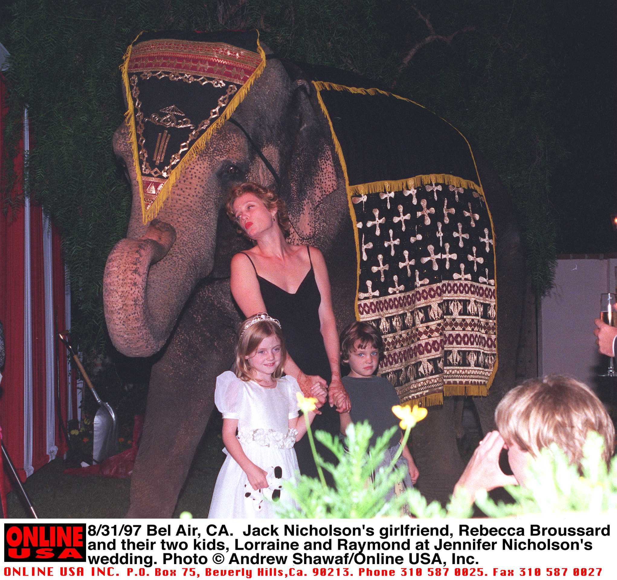 Lorraine Nicholson, Rebecca Broussard, and Raymond Nicholson at Jennifer Nicholson's wedding in Bel-Air, California on September 15, 1997 | Source: Getty Images