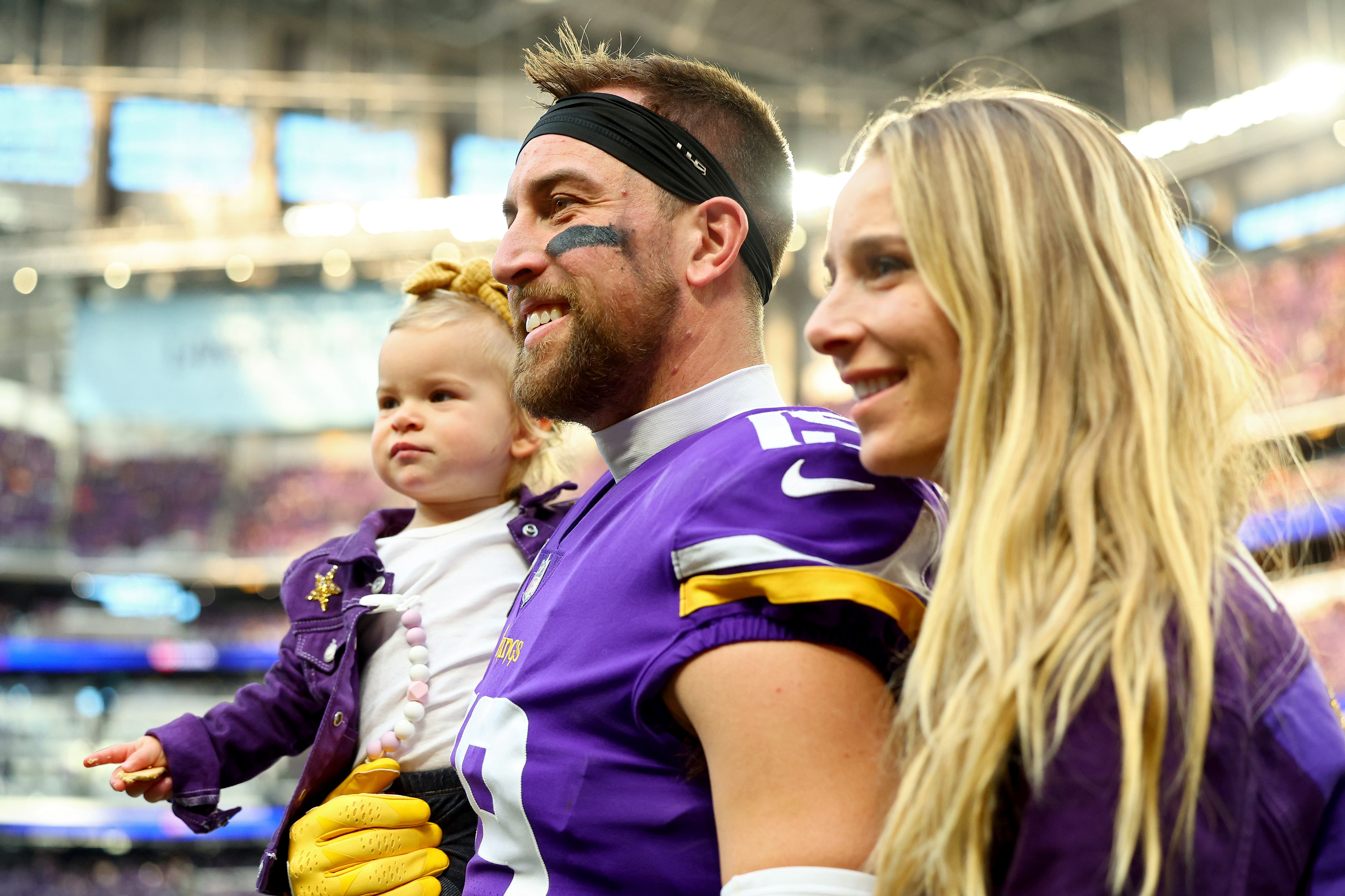 Adam Thielen visits with family prior to a game against the Dallas Cowboys at U.S. Bank Stadium on November 20, 2022, in Minneapolis, Minnesota | Source: Getty Images